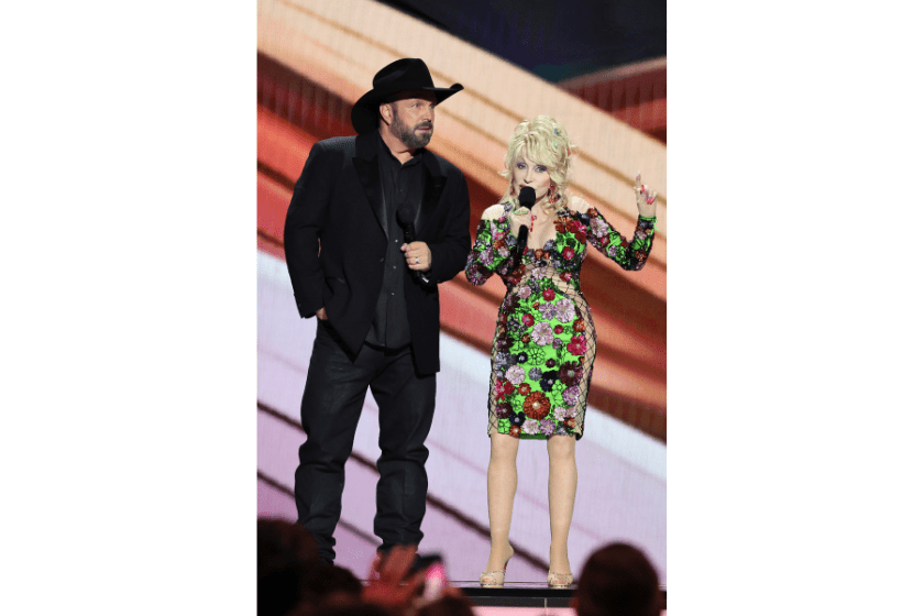 Garth Brooks and Dolly Parton speak onstage during the 58th Academy Of Country Music Awards at The Ford Center at The Star on May 11, 2023 in Frisco, Texas