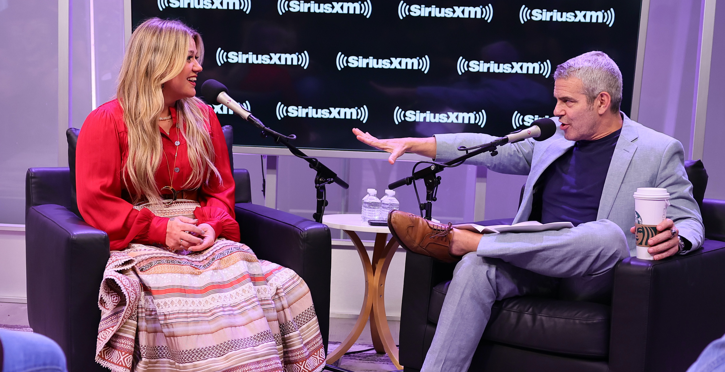 NEW YORK, NEW YORK - JUNE 21: Kelly Clarkson and Andy Cohen during the SiriusXM Town Hall at SiriusXM Studios on June 21, 2023 in New York City.