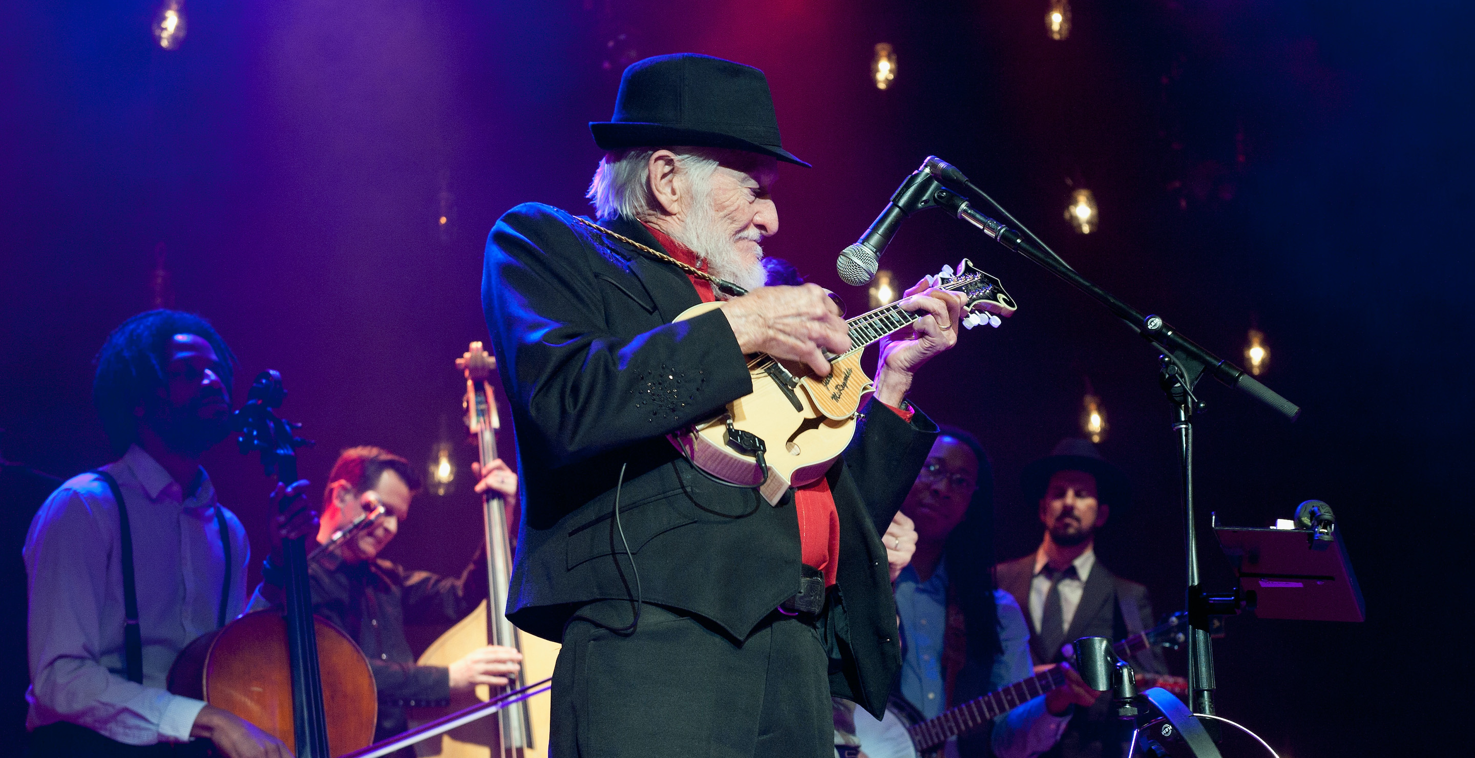 NASHVILLE, TN - DECEMBER 30: Jesse McReynolds of bluegrass duo Jim and Jessse performs with Old Crow Medicine Show at Ryman Auditorium on December 30, 2014 in Nashville, Tennessee.