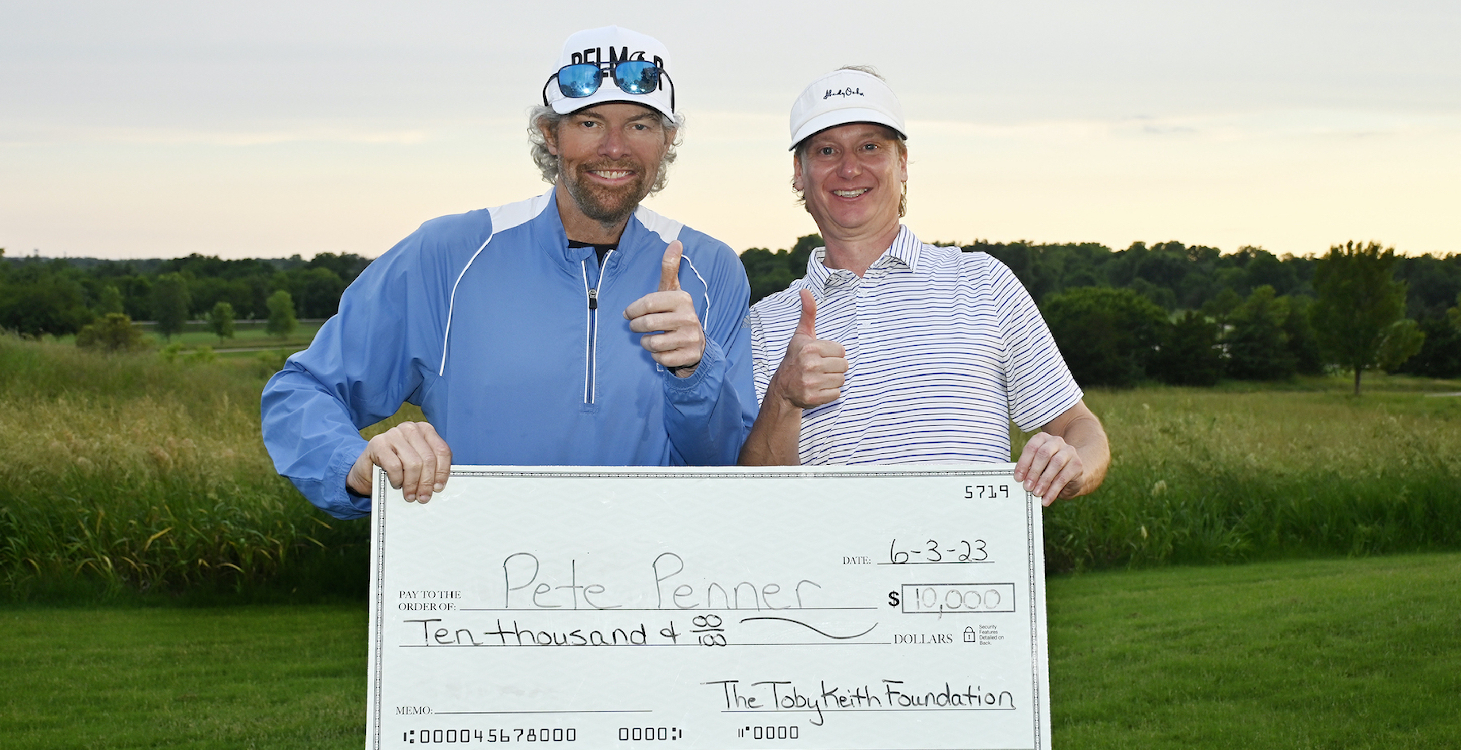 19th Toby Keith & Friends Golf Classic $10,000 shootout winner was Pete Penner (with Toby Keith on left).