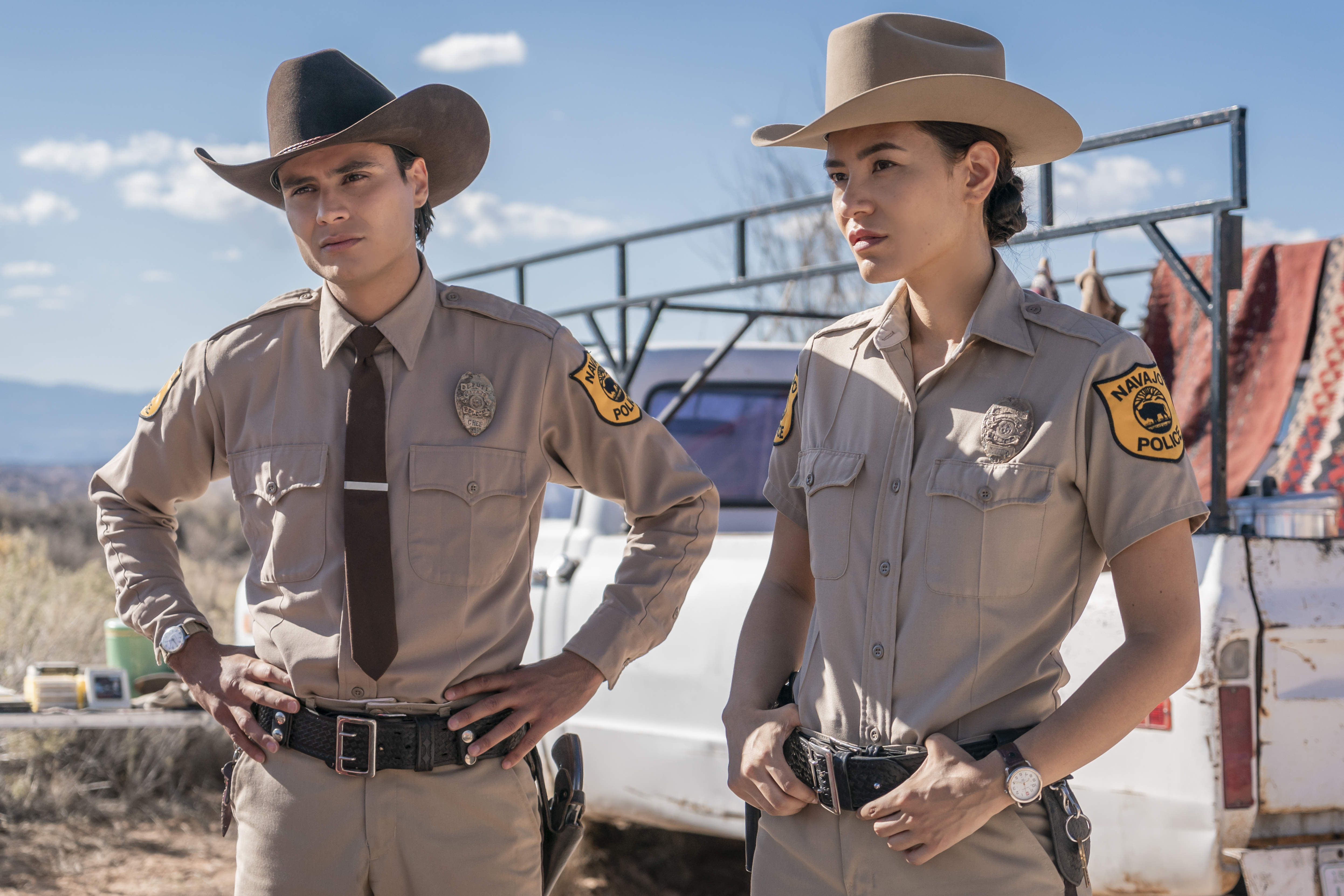 Kiowa Gordon as Jim Chee and Jessica Matten as Sgt. Bernadette Manuelito - Dark Winds _ Season 1, Episode 3