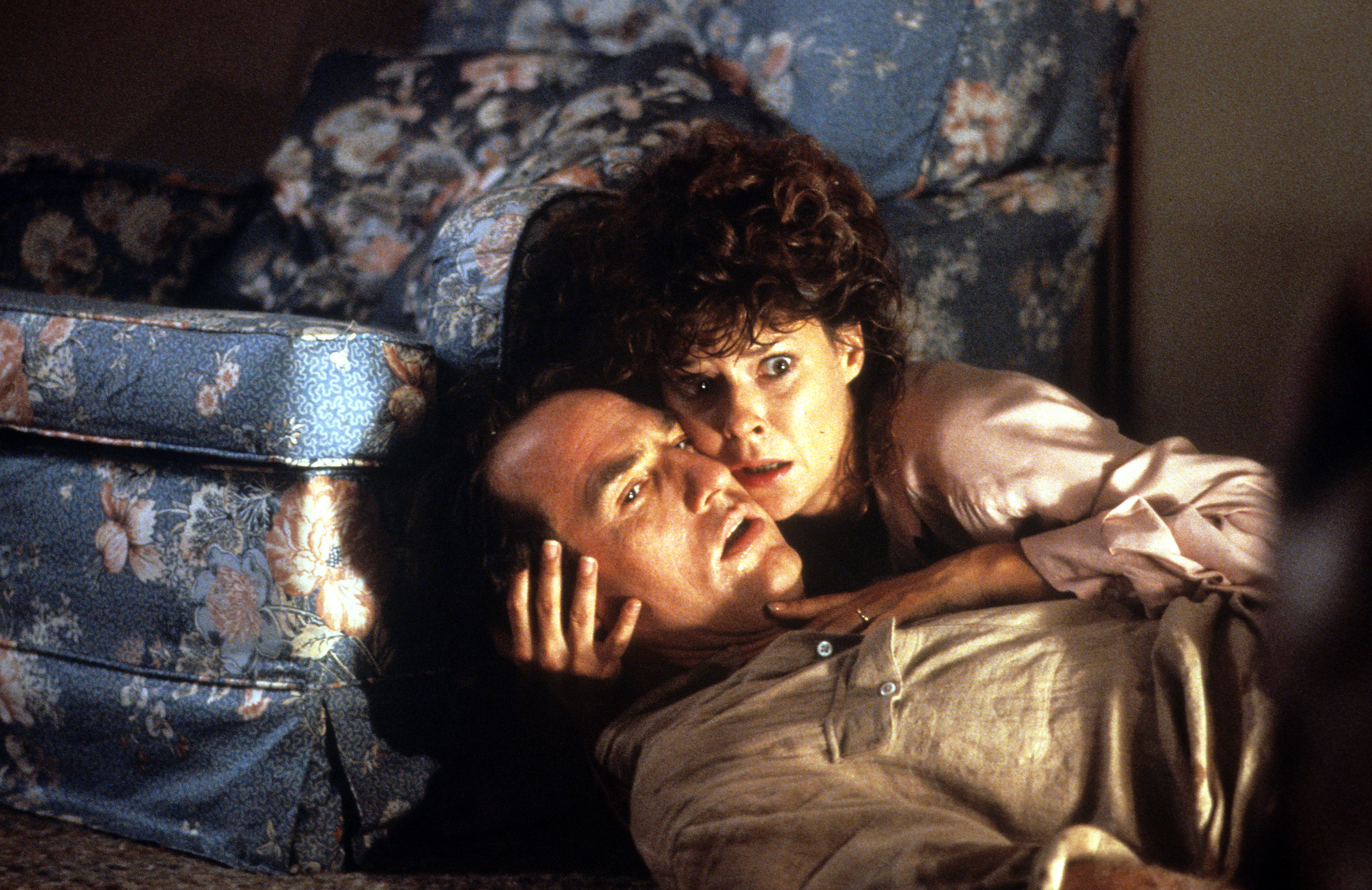 Craig T Nelson is held by JoBeth Williams in a scene from the film 'Poltergeist II: The Other Side', 1986