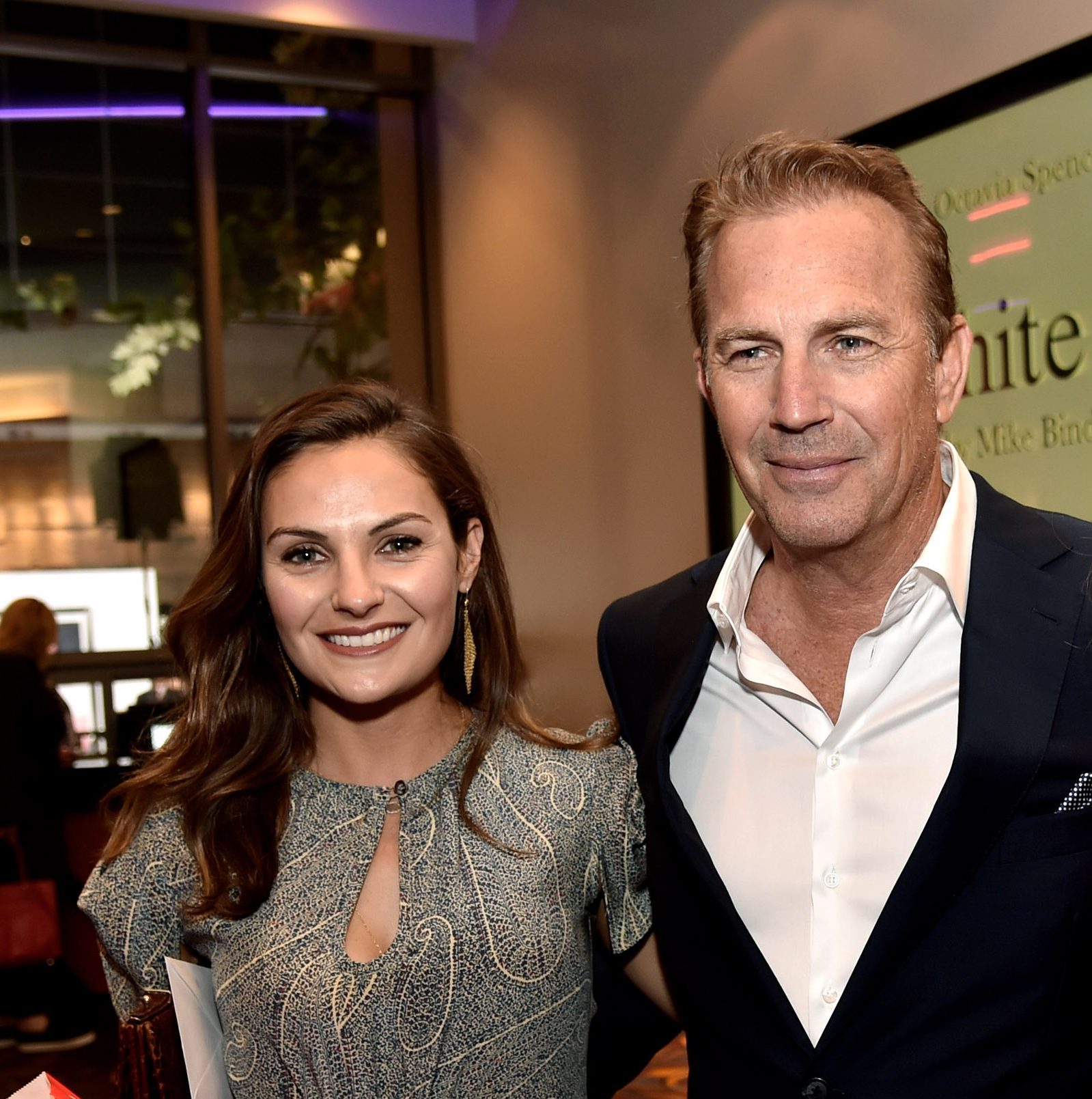 LOS ANGELES, CA - JANUARY 20: (L-R) Actress Annie Costner, actor Kevin Costner and actress Lily Costner arrive at the premiere of Relativity Media's "Black Or White" at the Regal Cinemas L.A. Live on January 20, 2015 in Los Angeles, California.