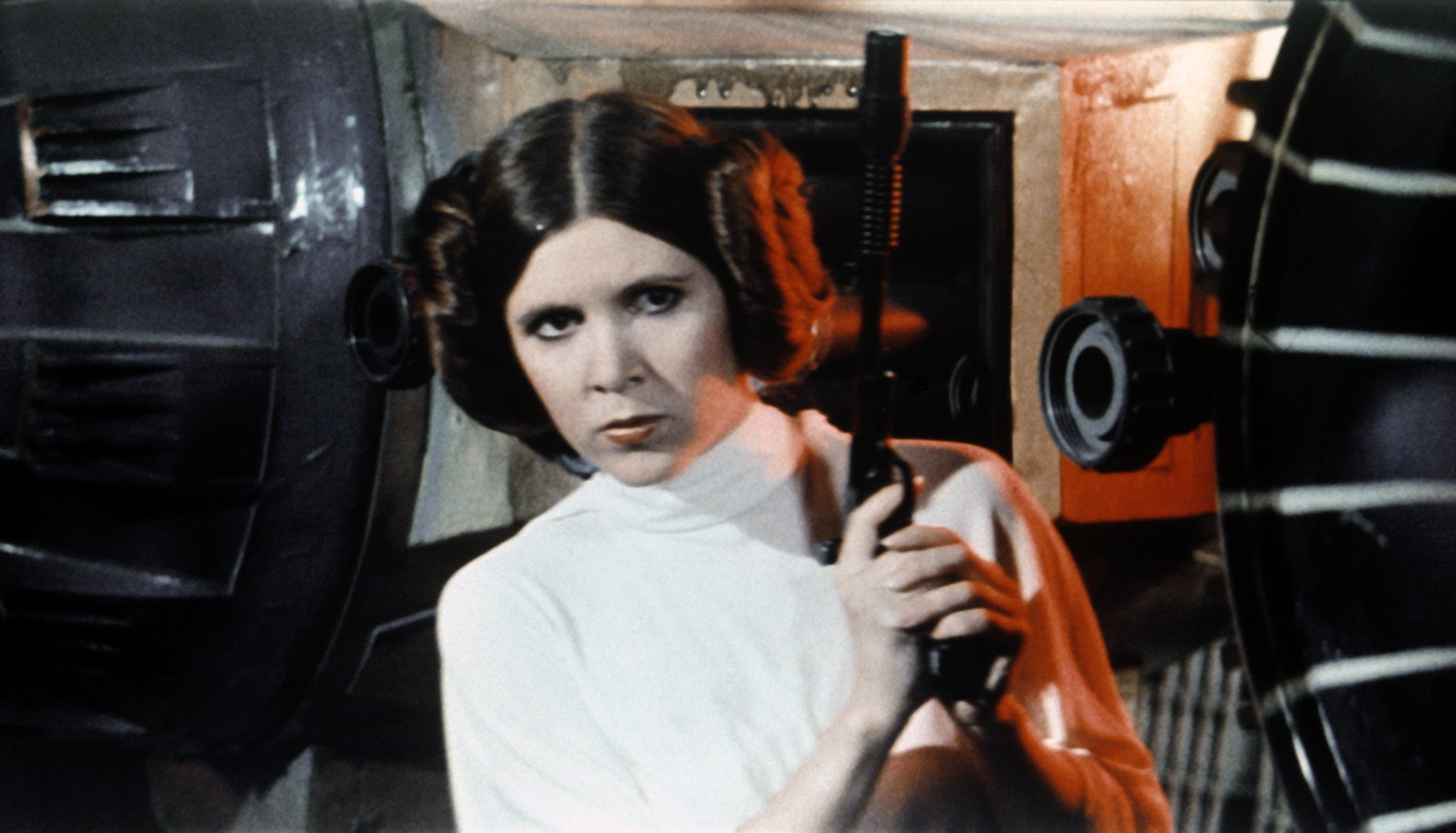 American actress Carrie Fisher on the set of Star Wars: Episode IV - A New Hope written, directed and produced by Georges Lucas. 