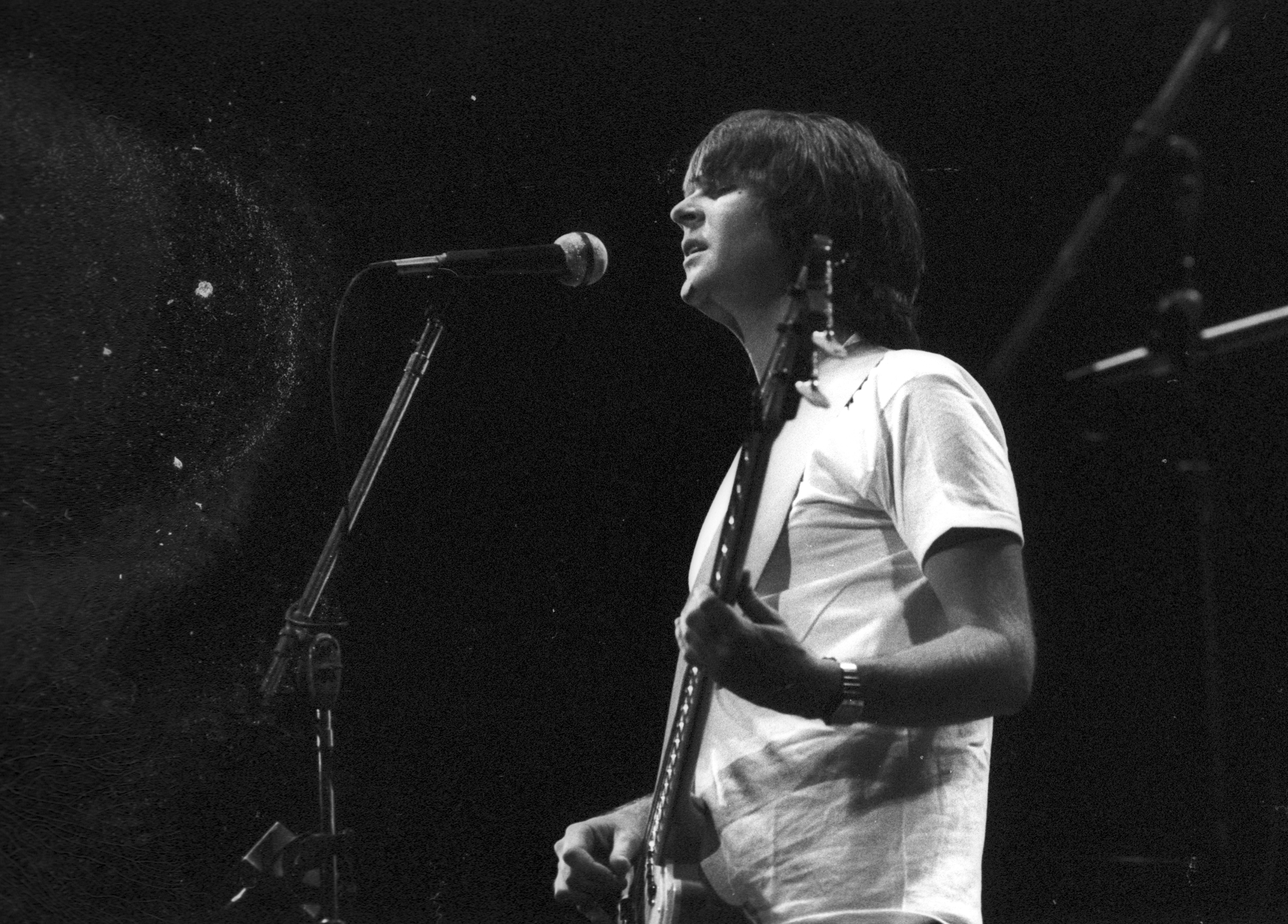 Randy Meisner of the rock band 'Eagles' performs onstage with an acoustic guitar at the Omni Theatre on June 20, 1977 in Atlanta, Georgia.