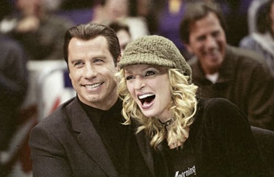 JOHN TRAVOLTA and UMA THURMAN star as Chili Palmer and Edie Athens in MGM Pictures' comedy BE COOL.