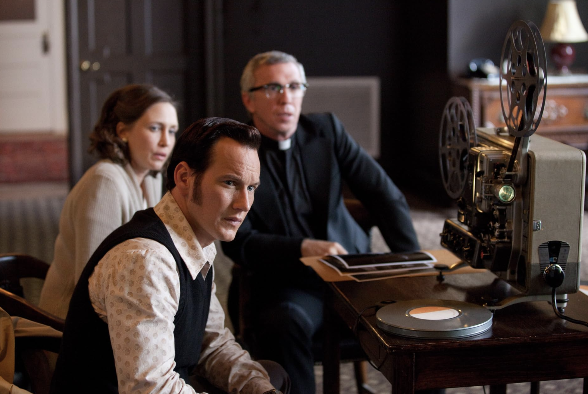 Steve Coulter, Vera Farmiga, and Patrick Wilson in The Conjuring (2013)