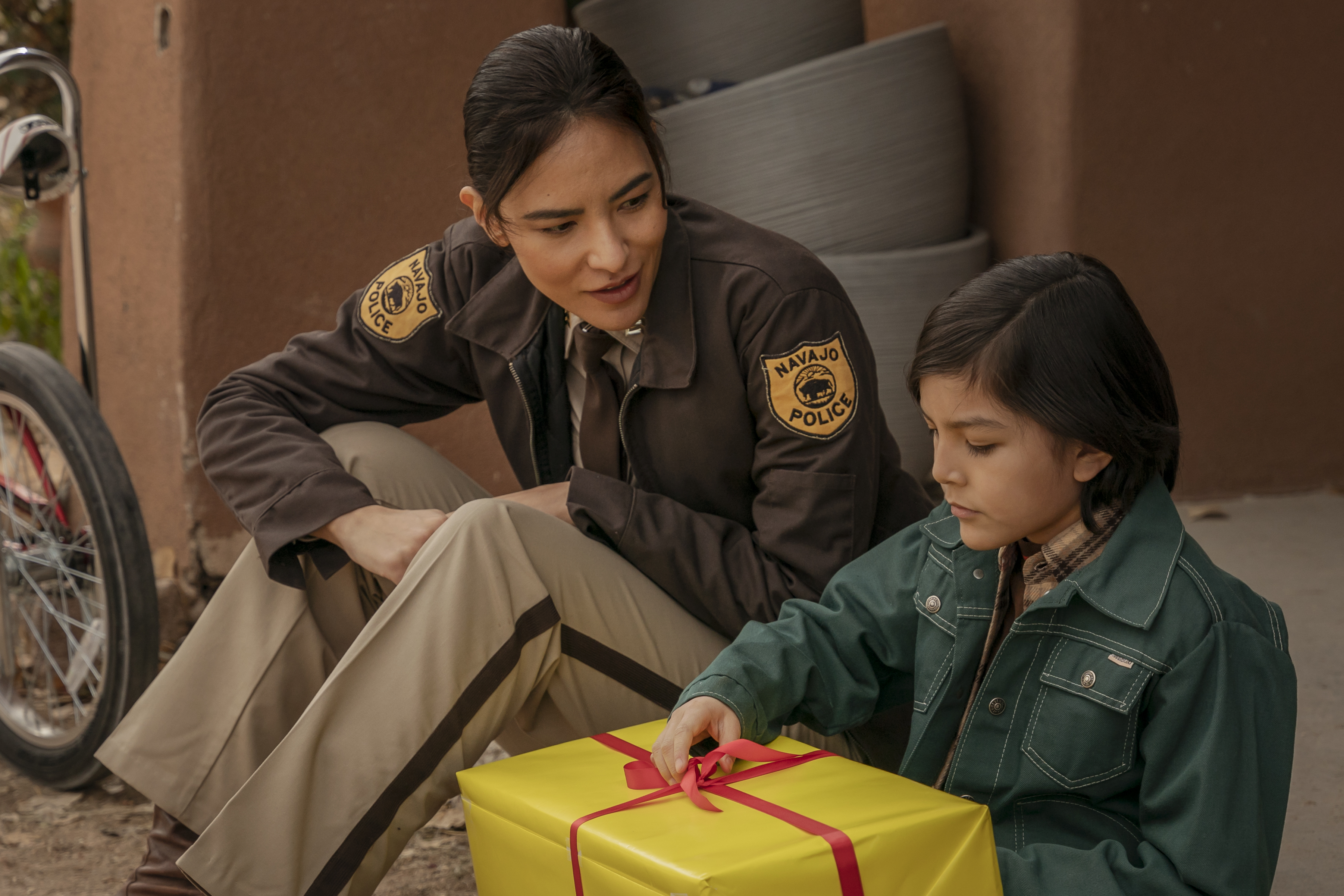 Jessica Matten as Sgt. Bernadette Manuelito and Jet James Grant as Benny Charley - Dark Winds _ Season 2, Episode 2 