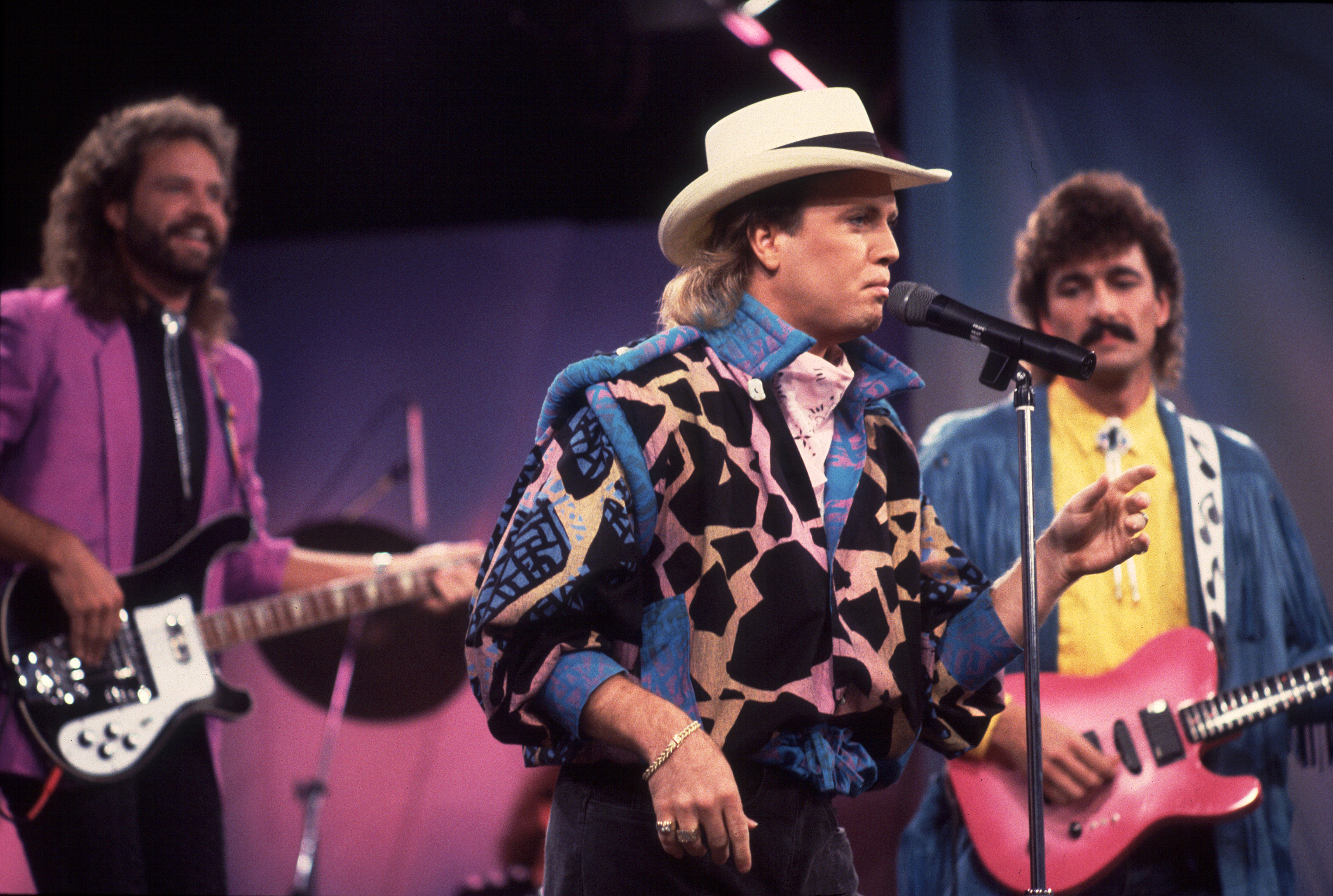 Jim Scholten, Mark Miller, and Bobby Randall of Sawyer Brown appear on the Oprah Winfrey Show to promote the movie Backdraft, Chicago, Illinois, November 1, 1986. 