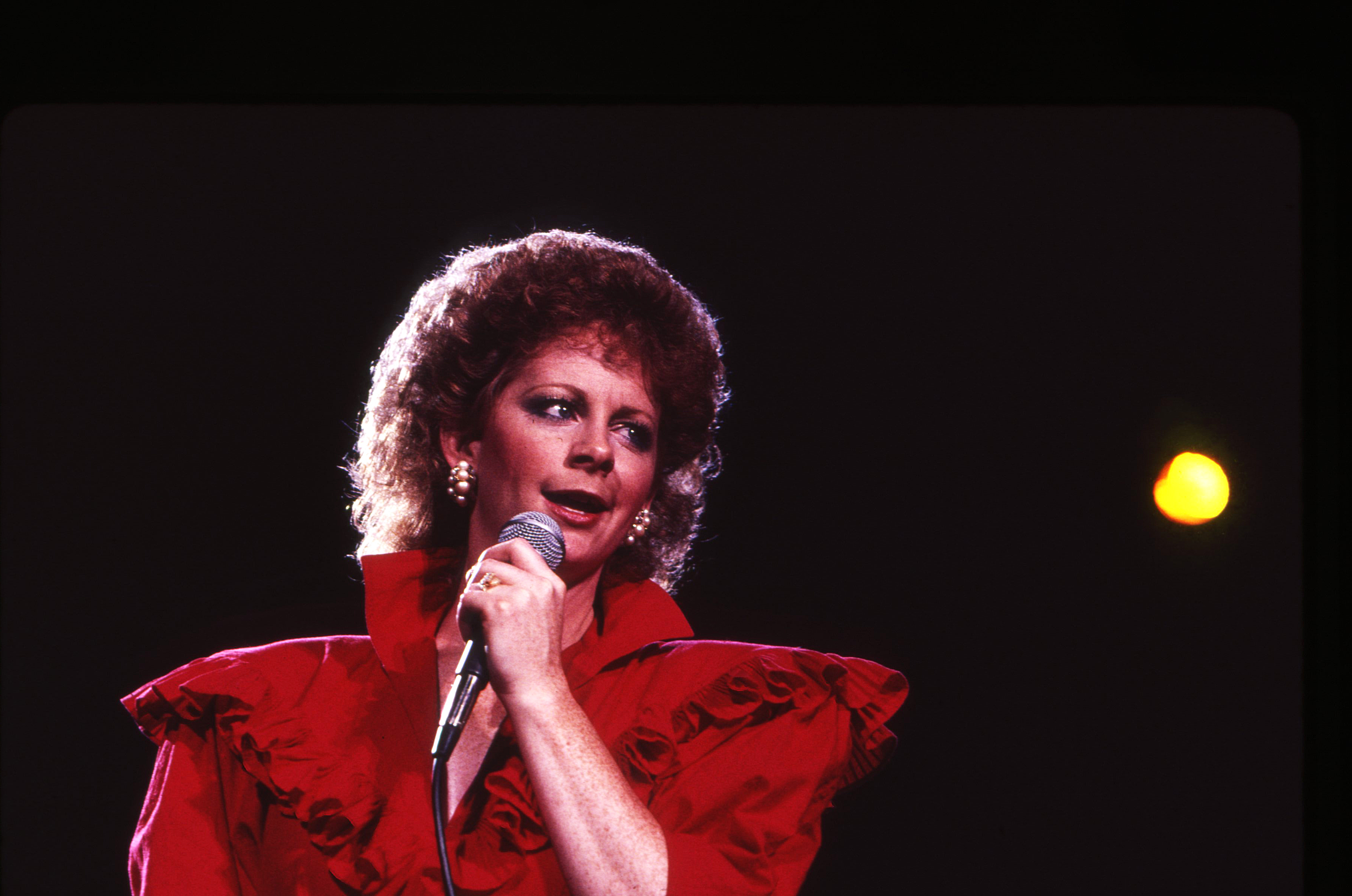 NASHVILLE -June 26: Country Music Singer Songwriter Reba McEntire receives a Music City News Award on June 26, 1987 in Nashville, Tennessee 