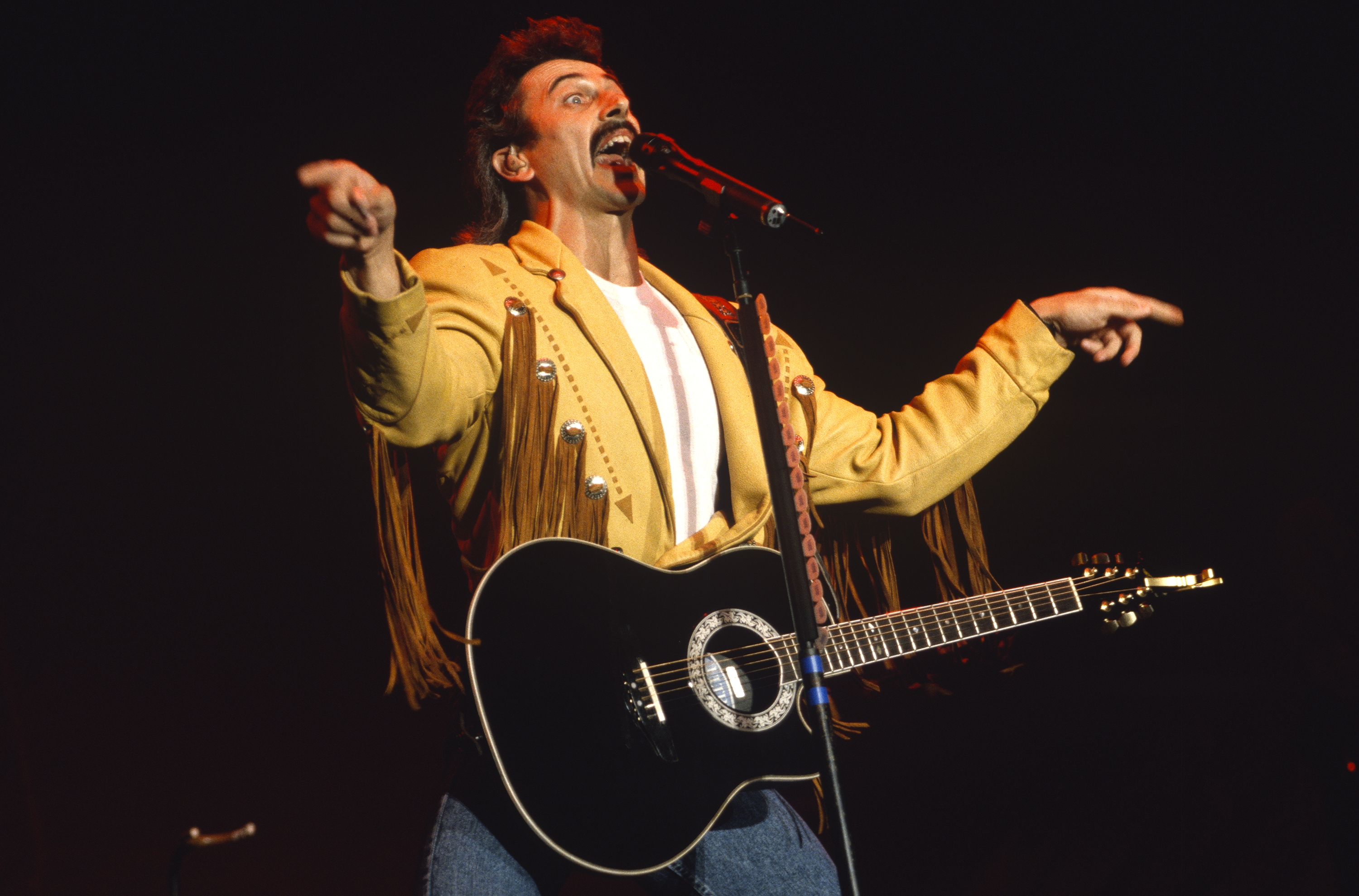 Aaron Tippin performs at Shoreline Amphitheatre on September 21, 1992 in Mountain View, California. 