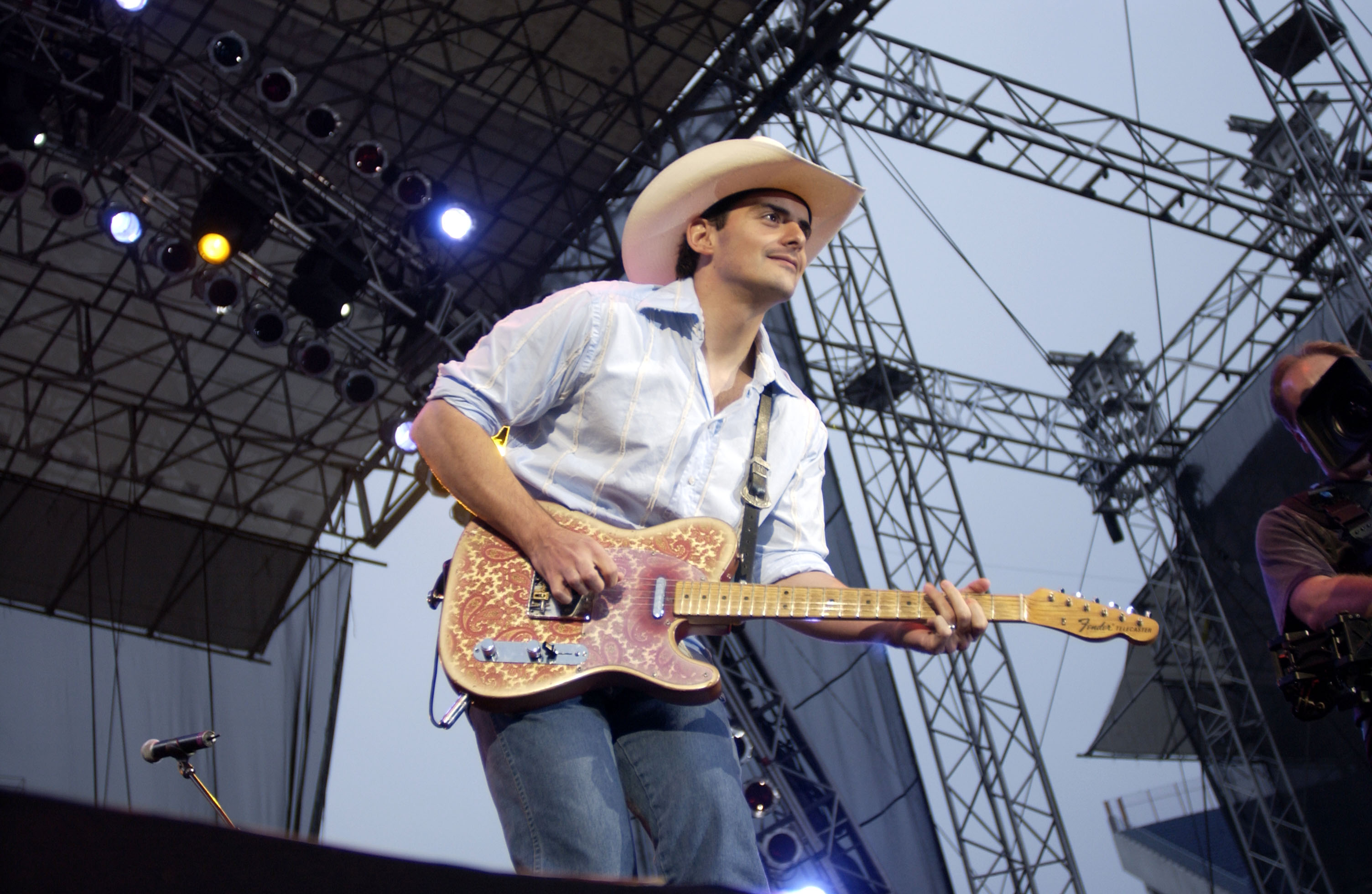 NASHVILLE, TN - JUNE 6: Brad Paisley performs at the 32nd annual FanFair country music festival June 6, 2003 in Nashville, Tennessee. The four-day festival, staged by the Country Music Association, is the largest of its kind and offers fans close access to many of country's biggest stars as well as nightly concerts featuring the genre's top performers. (