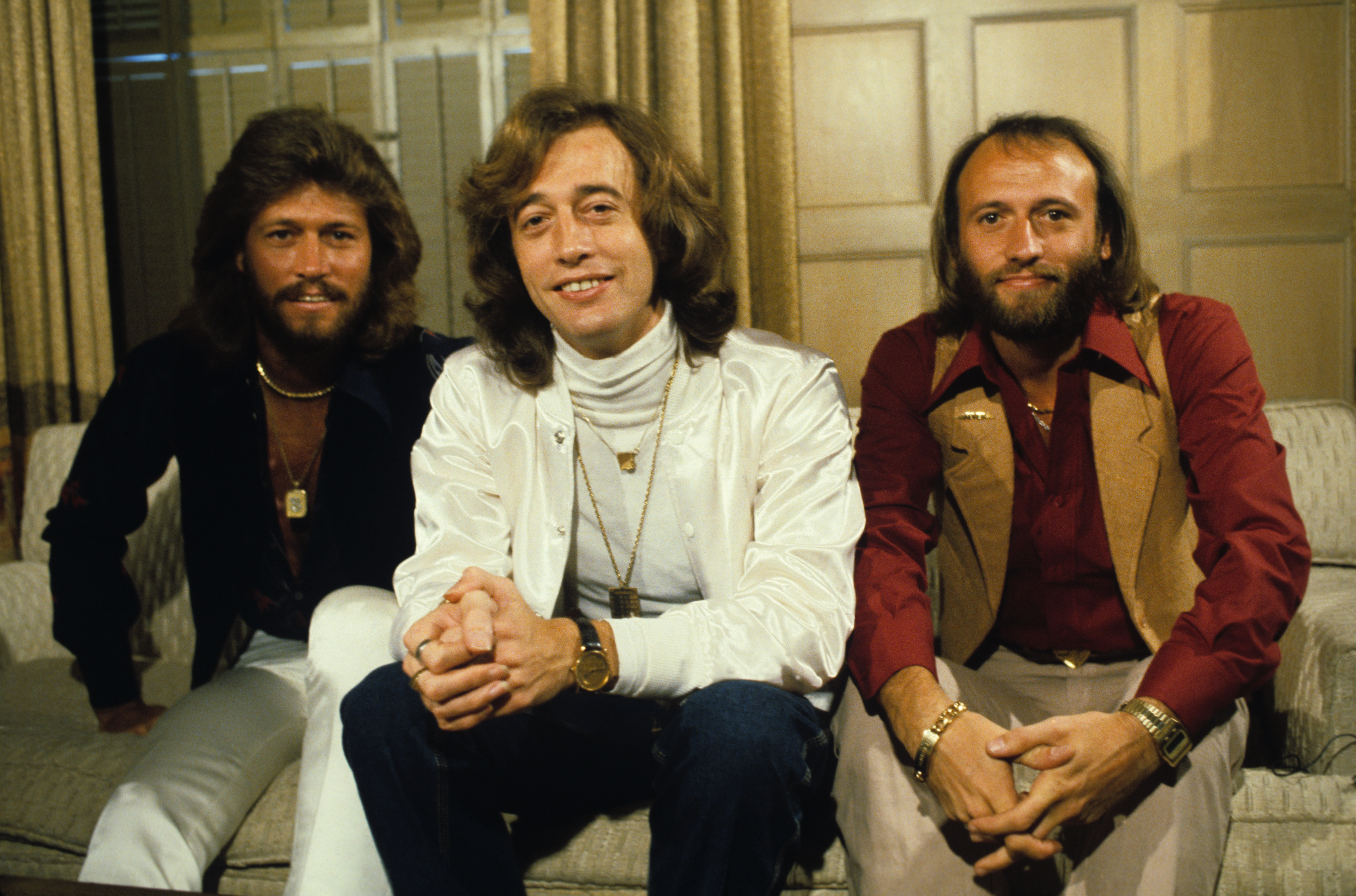 The popular disco band, The Bee Gees, pose for a portrait. 