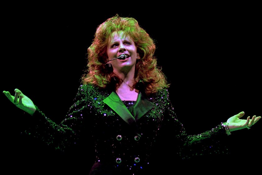 Reba McEntire performs at the Rosemont Horizon, August 25, 1997.