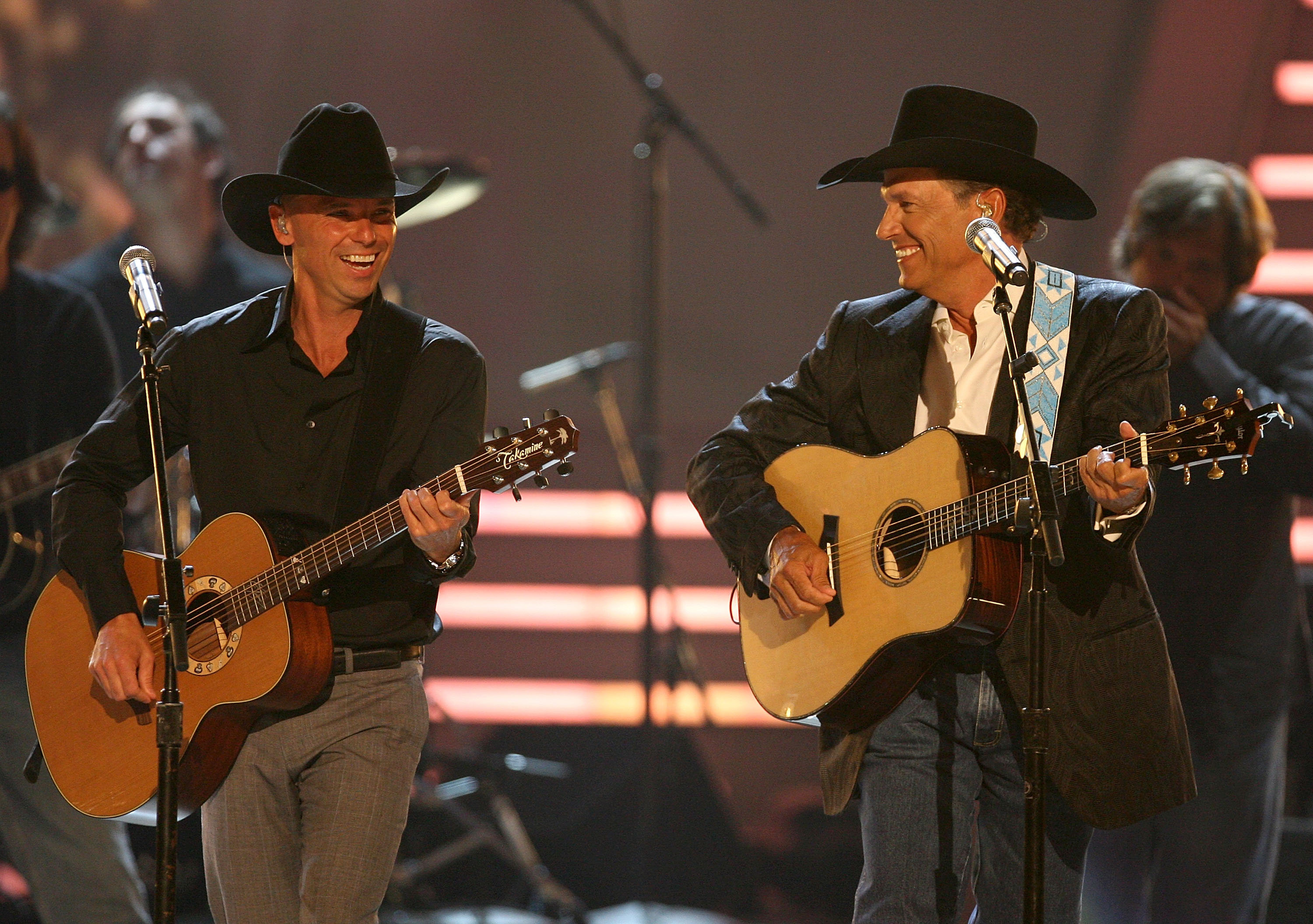 LAS VEGAS - MAY 18: Musicians Kenny Chesney (L) and George Strait perform onstage during the 43rd annual Academy Of Country Music Awards held at the MGM Grand Garden Arena on May 18, 2008 in Las Vegas, Nevada. 
