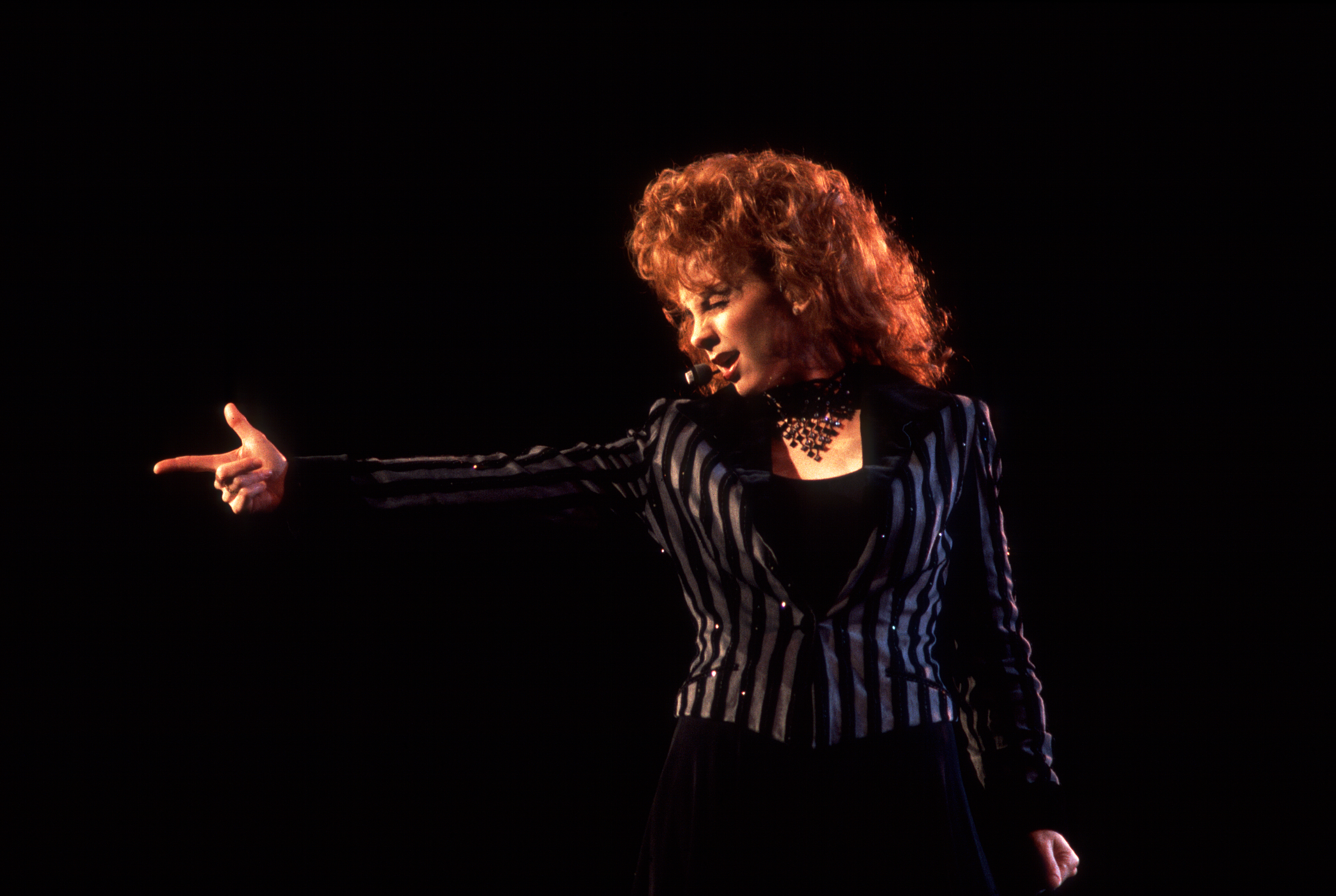 Reba McEntire performing at the World Music Theater in Tinley Park, Illinois, August 12, 1995. 