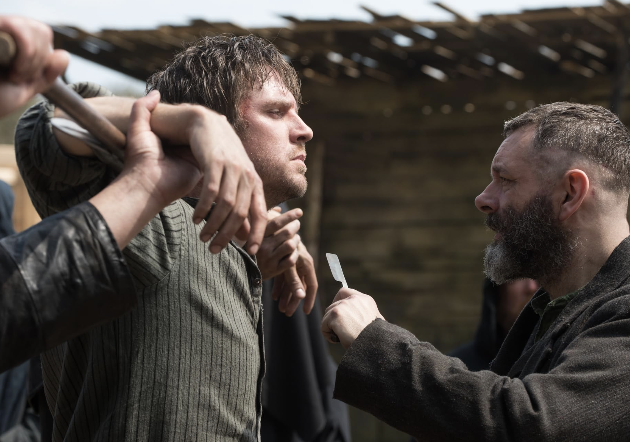 Michael Sheen and Dan Stevens in Apostle (2018)