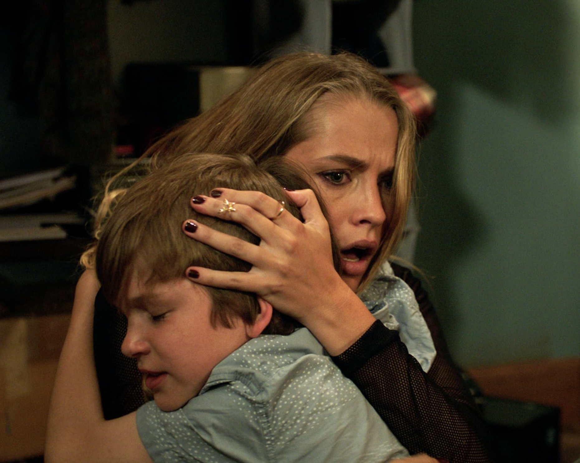 Teresa Palmer and Gabriel Bateman in Lights Out (2016)