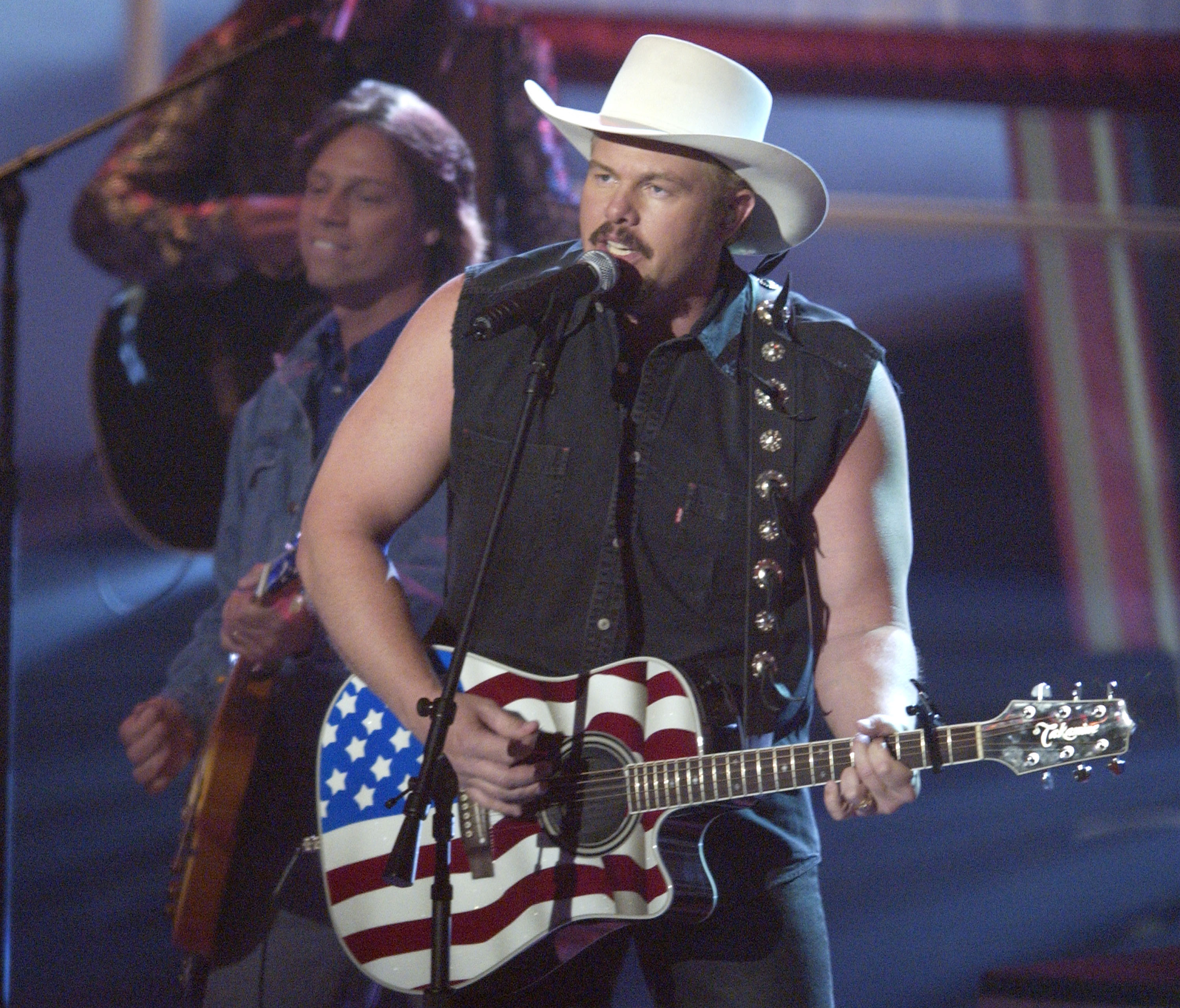 Toby Keith performs "Courtesy of the Red, White and Blue" at the 37th Academy of Country Music Awards at the Universal Amphiteater May 22, 2002. 