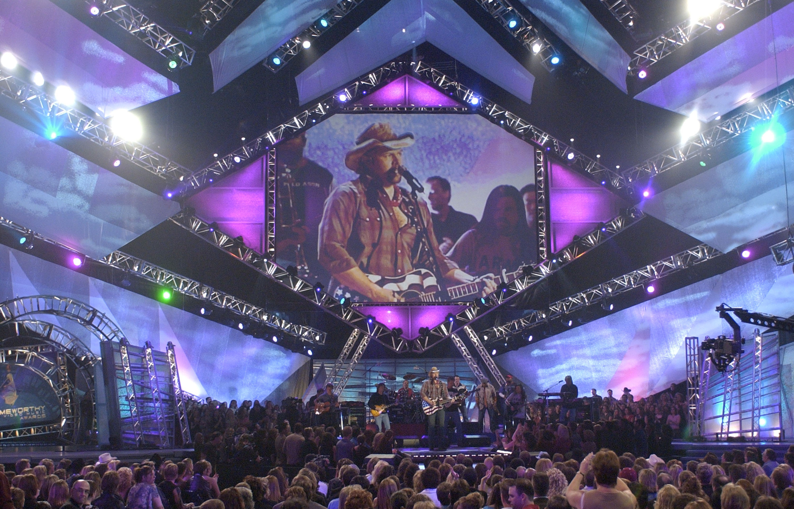 Toby Keith on stage during 2003 CMT Flameworthy Awards - Show at The Gaylord Center in Nashville, Tennessee, United States.