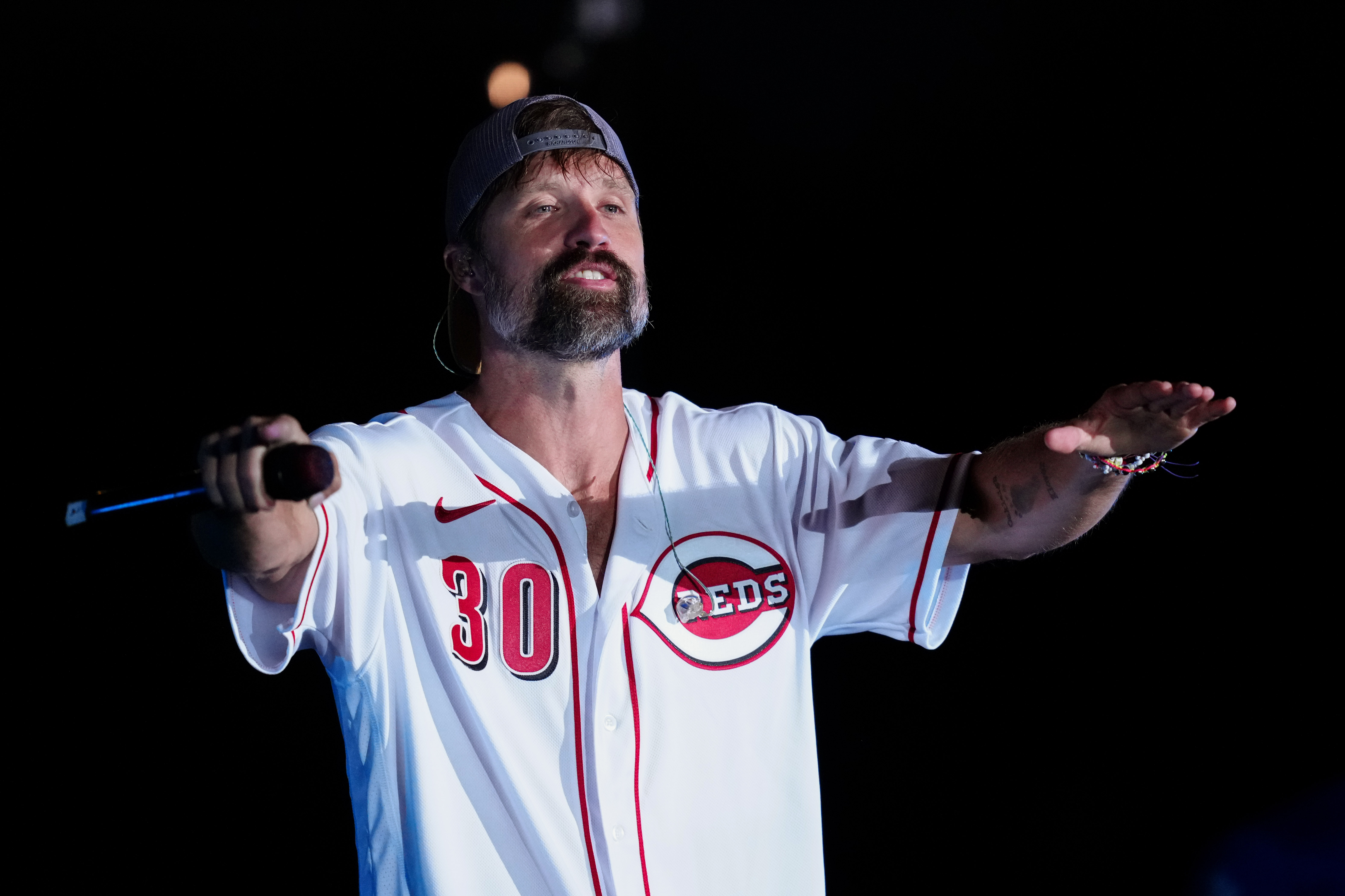 DYERSVILLE, OH - AUGUST 11: Walker Hayes performs after the game between the Chicago Cubs and the Cincinnati Reds at The MLB Field at Field of Dreams on Thursday, August 11, 2022 in Dyersville, Iowa.