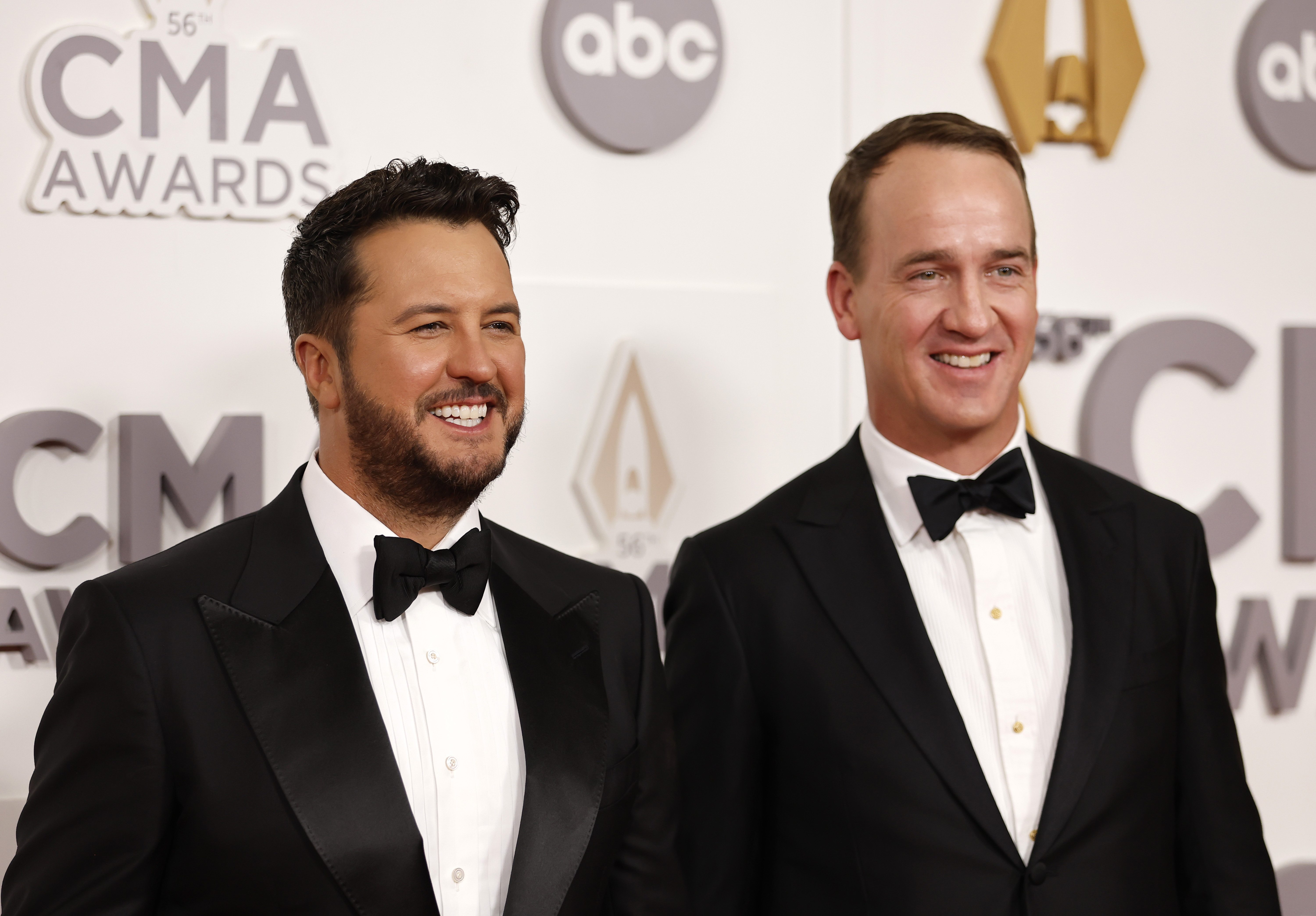 NASHVILLE, TENNESSEE - NOVEMBER 09: Luke Bryan and Peyton Manning attend The 56th Annual CMA Awards at Bridgestone Arena on November 09, 2022 in Nashville, Tennessee.