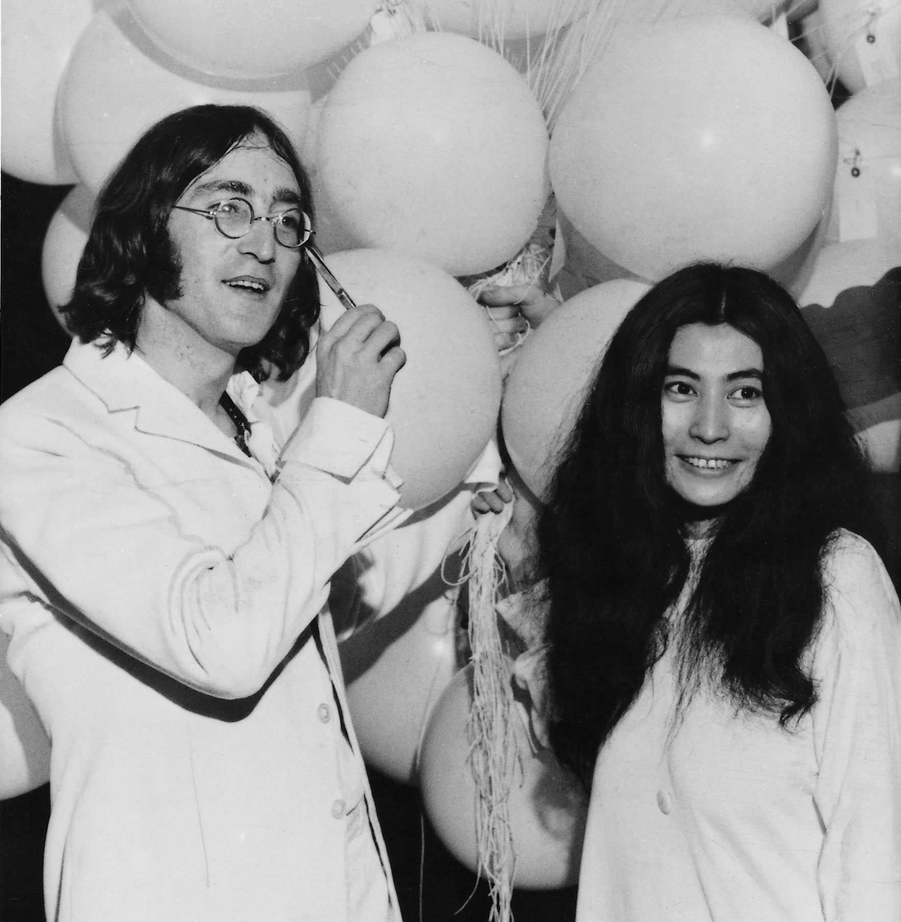 John Lennon with Yoko Ono at 'You are here' art exhibition 1 July 1968. 