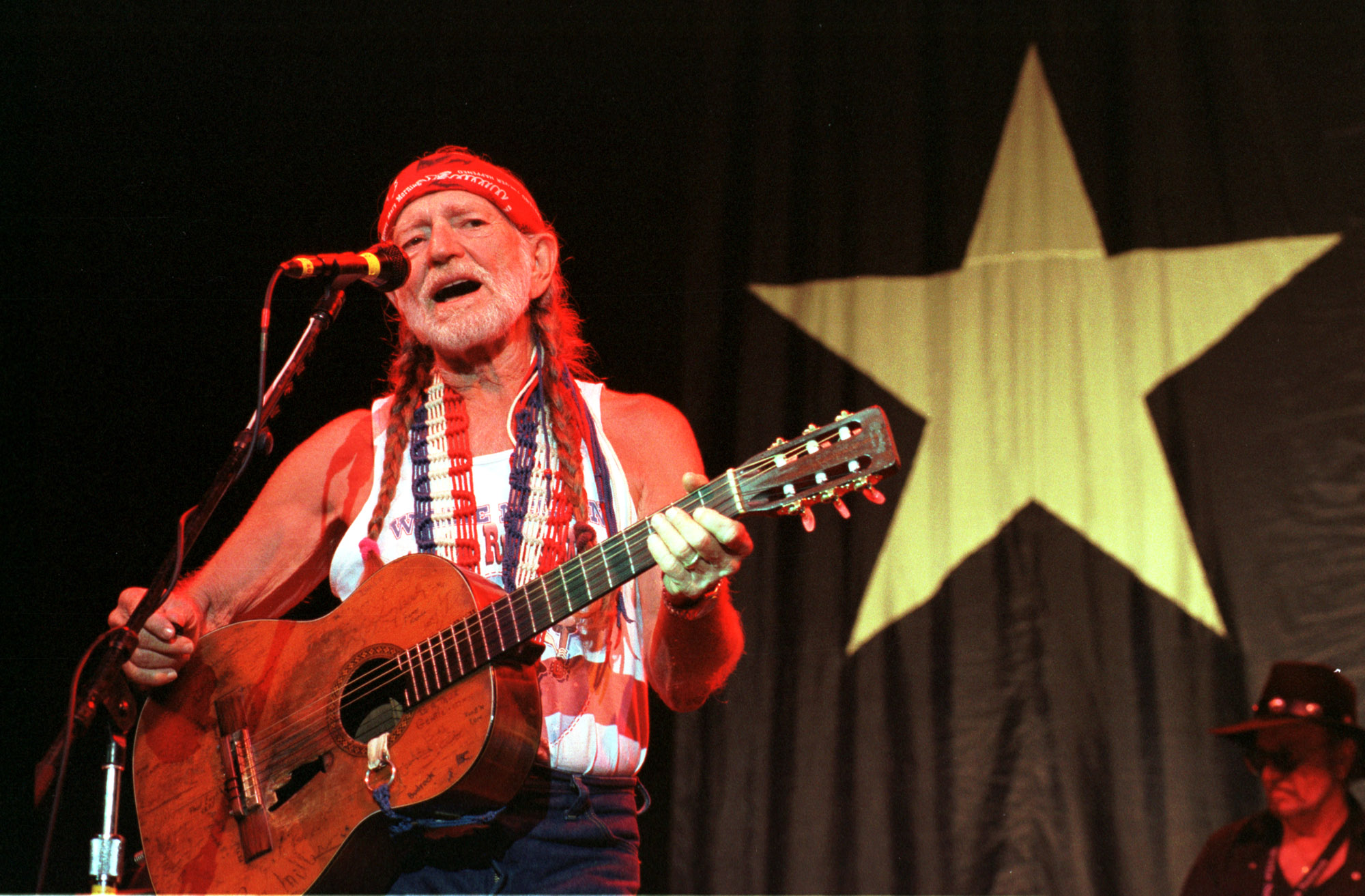 Willie Nelson plays the headline set of the Willie Nelson Family Picnic Sunday, Aug. 1, 1999, at the Cynthia Woods Mitchell Pavilion in The Woodlands, Texas. 