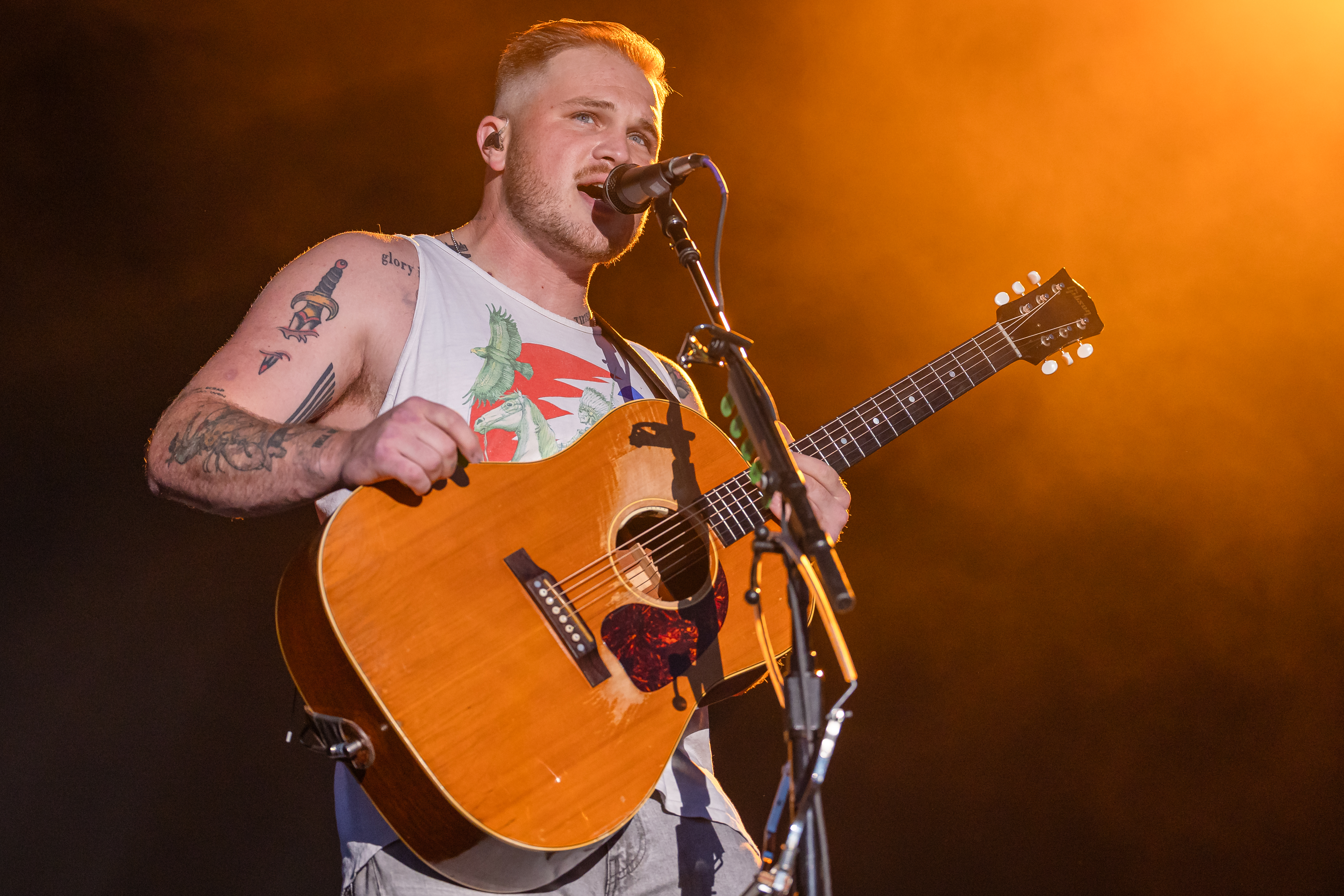 CHICAGO, ILLINOIS - JULY 13: Zach Bryan performs during the Windy City Smokeout at the United Center on July 13, 2023 in Chicago, Illinois.