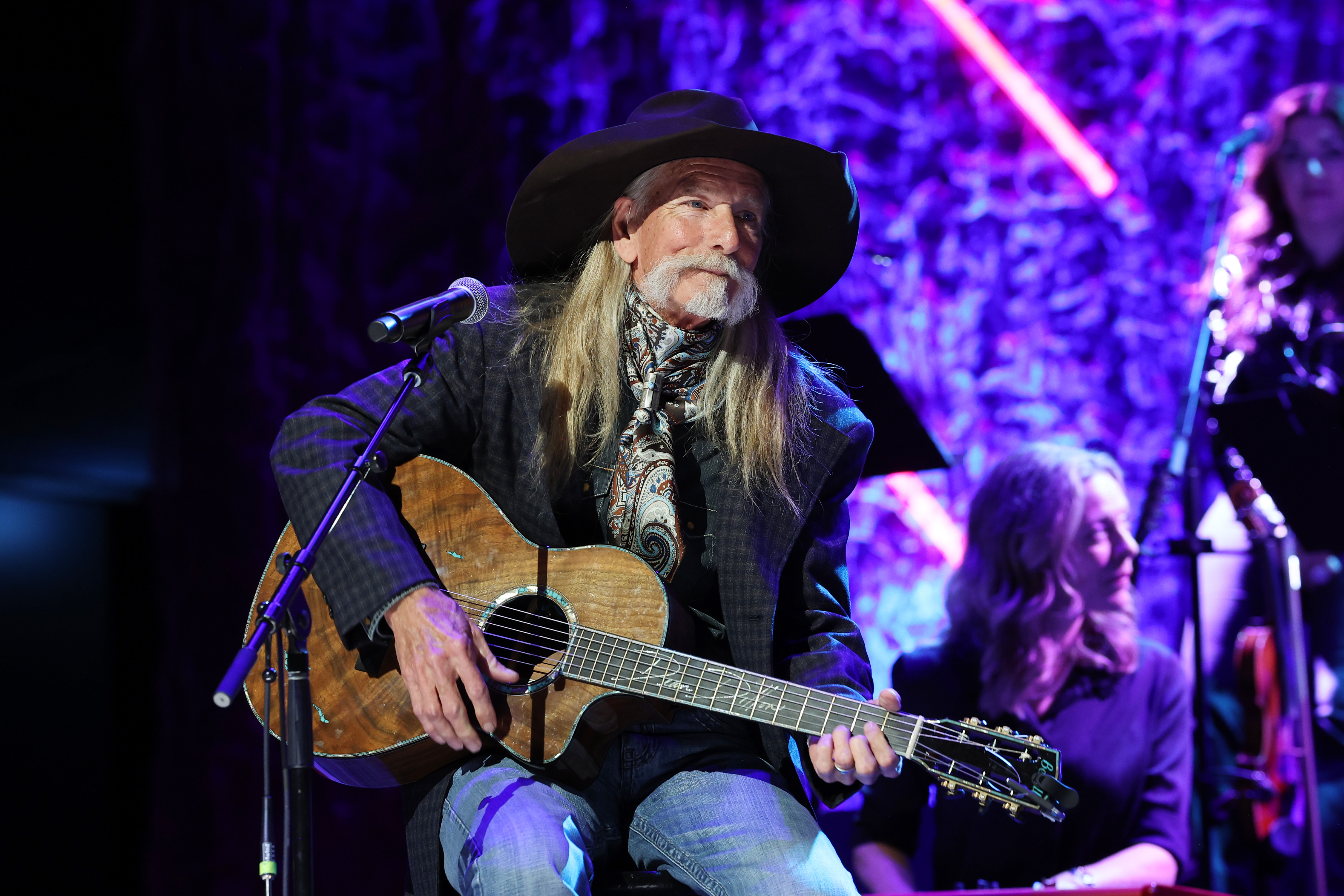 NASHVILLE, TENNESSEE - OCTOBER 22: (EDITORIAL USE ONLY) Dean Dillon performs onstage during the Class of 2023 Medallion Ceremony at Country Music Hall of Fame and Museum on October 22, 2023 in Nashville, Tennessee.