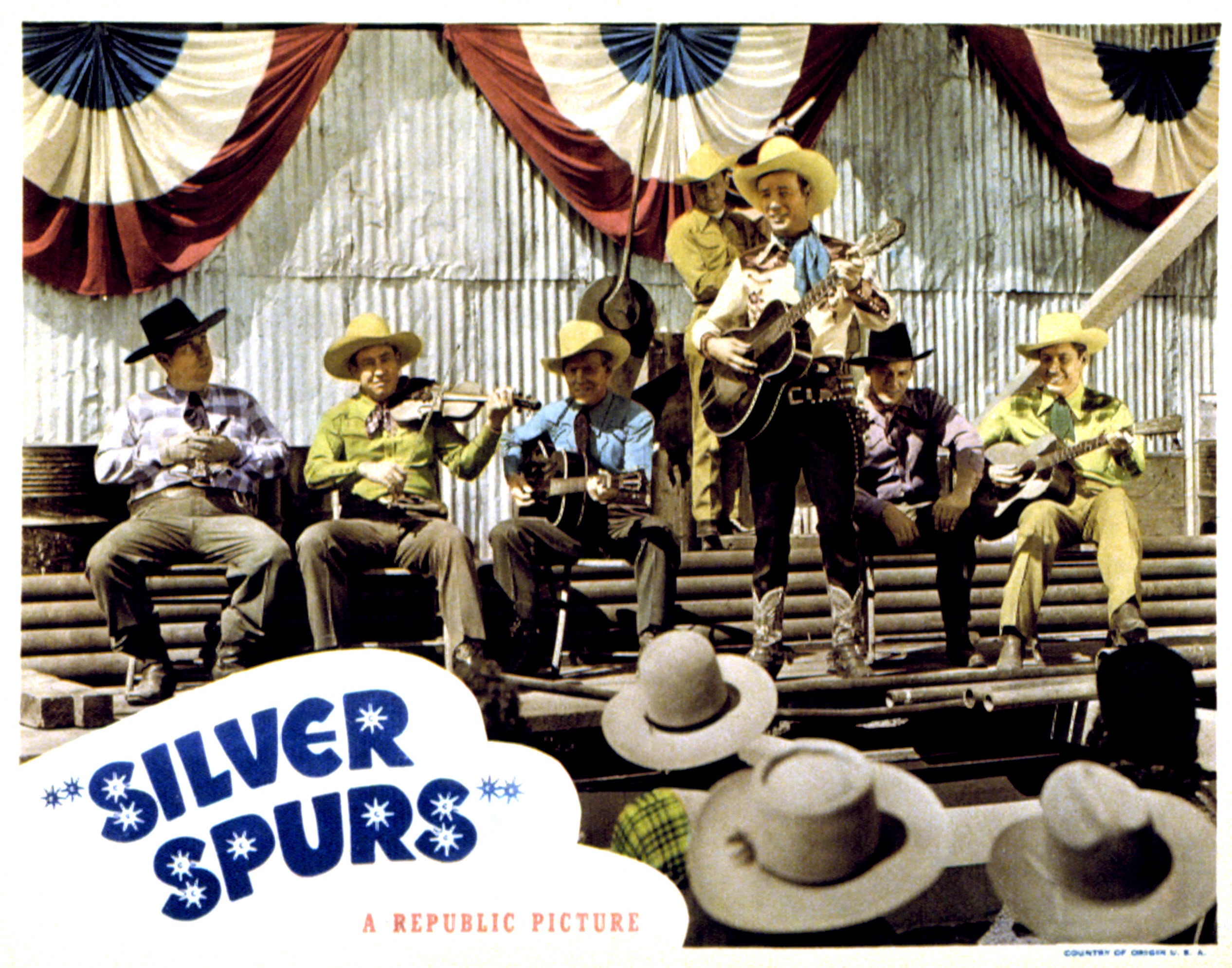 Silver Spurs, lobbycard, Roy Rogers (standing) and the Sons of the Pioneers, 1943. 