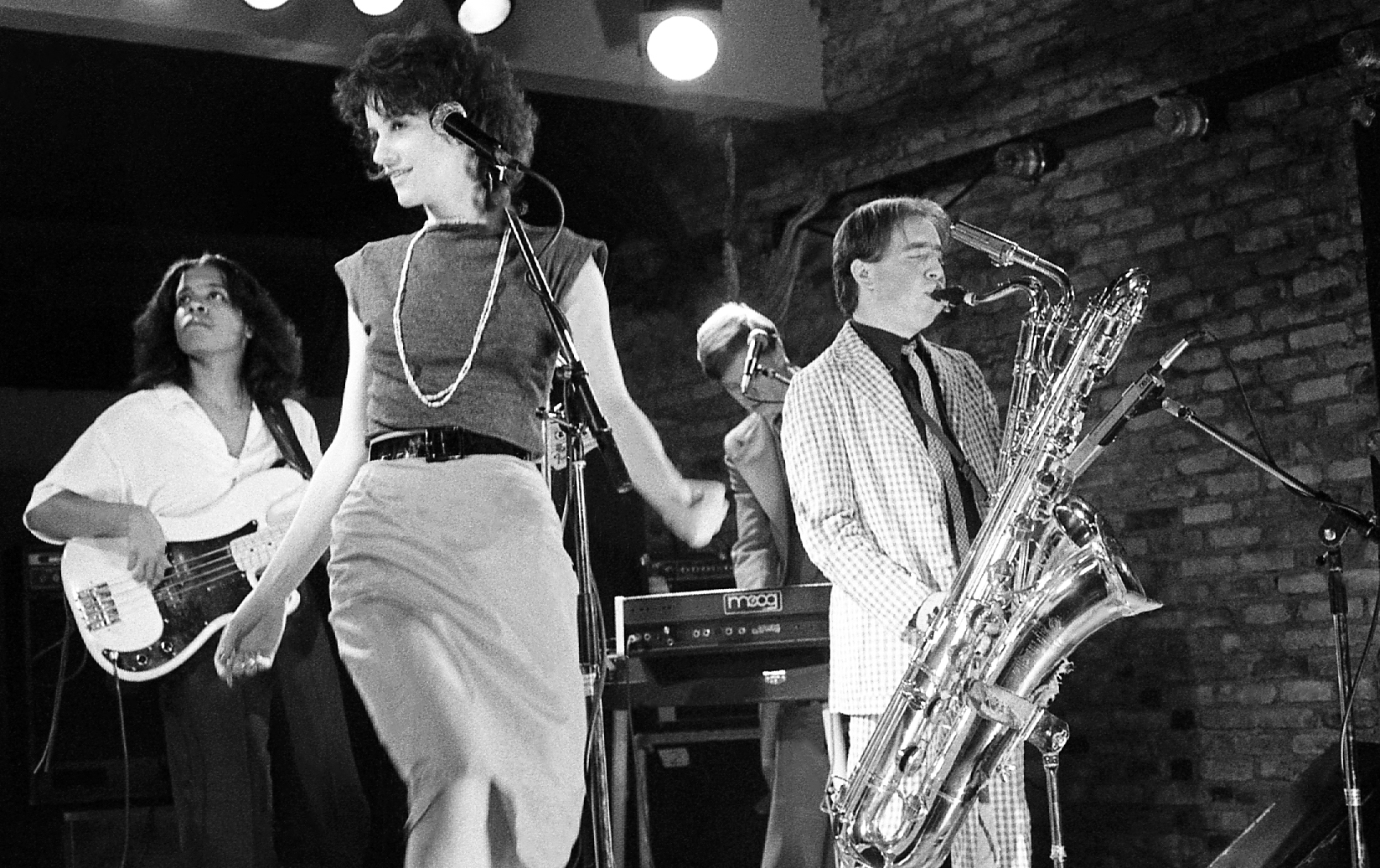 (L-R) Bass guitarist Tracy Wormworth, lead singer Patty Donahue (1956 - 1996), keyboardist Dan Klayman and jazz and rock saxophonist Mars Williams, of the American new wave band The Waitresses, perform on stage at The Peppermint Lounge, New York, New York, October 14, 1981. 