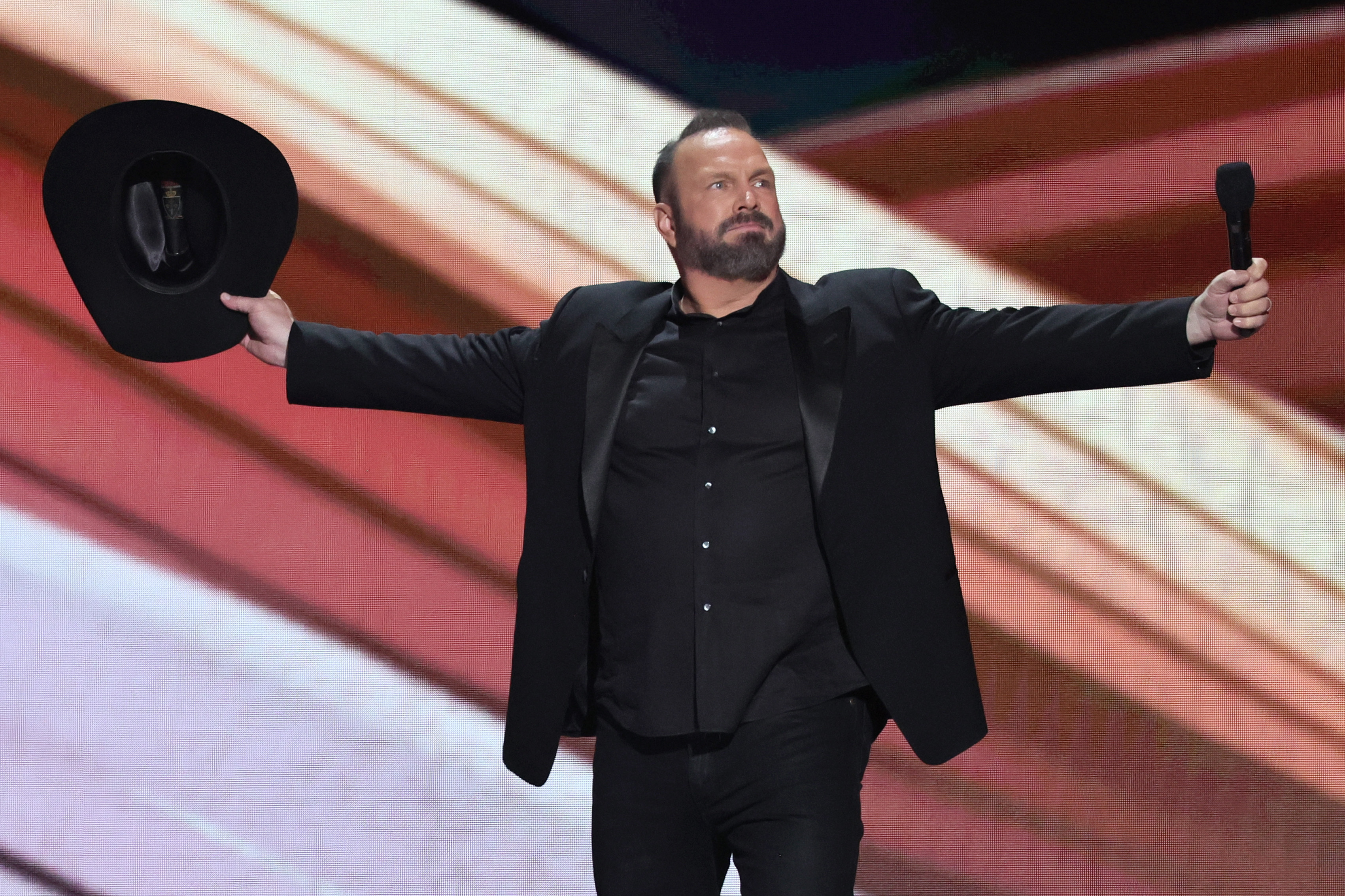 FRISCO, TEXAS - MAY 11: Co-host Garth Brooks speaks onstage during the 58th Academy Of Country Music Awards at The Ford Center at The Star on May 11, 2023 in Frisco, Texas.