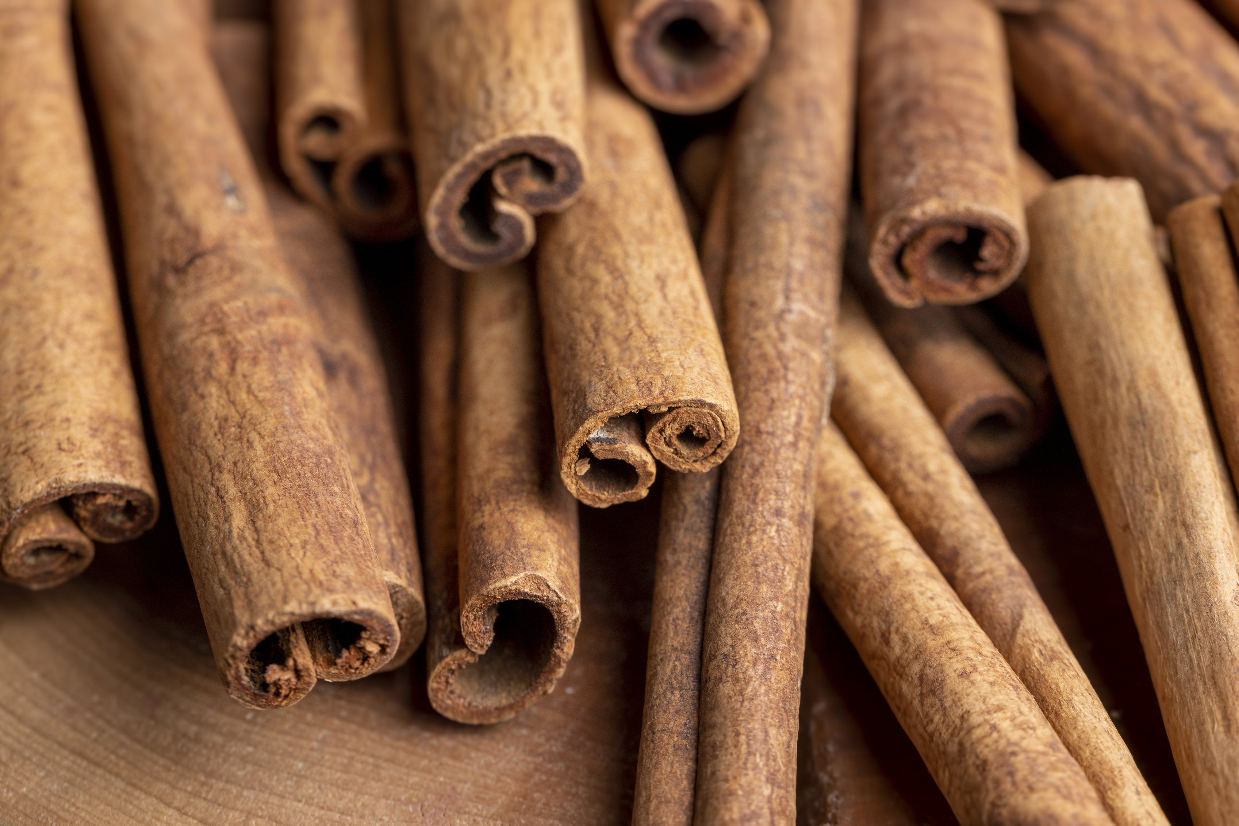Whole dried cinnamon for baking, heaped fragrant cinnamon spice