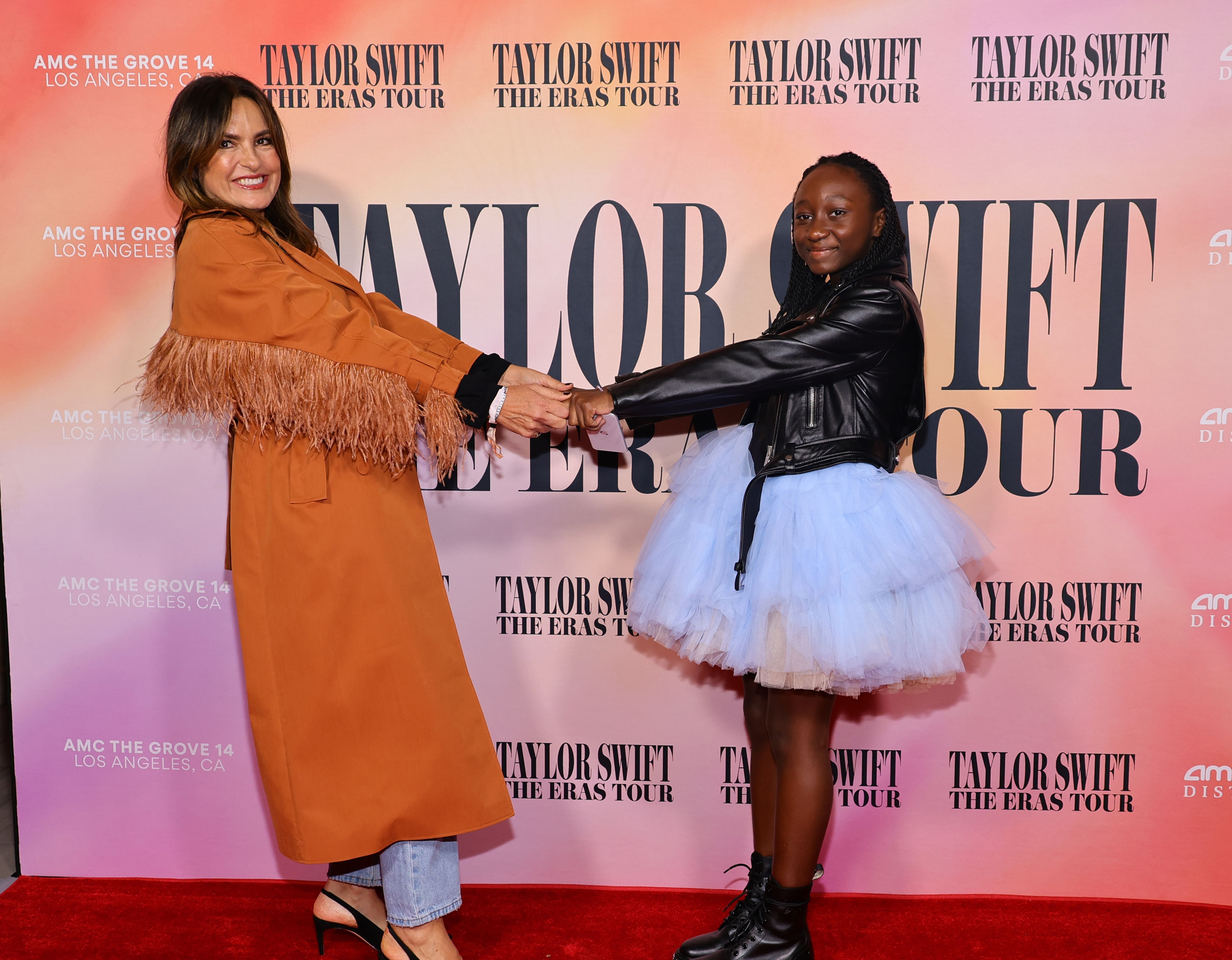 LOS ANGELES, CALIFORNIA - OCTOBER 11: (L-R) Mariska Hargitay and Amaya Hermann attend "Taylor Swift: The Eras Tour" Concert Movie World Premiere at AMC The Grove 14 on October 11, 2023 in Los Angeles, California.