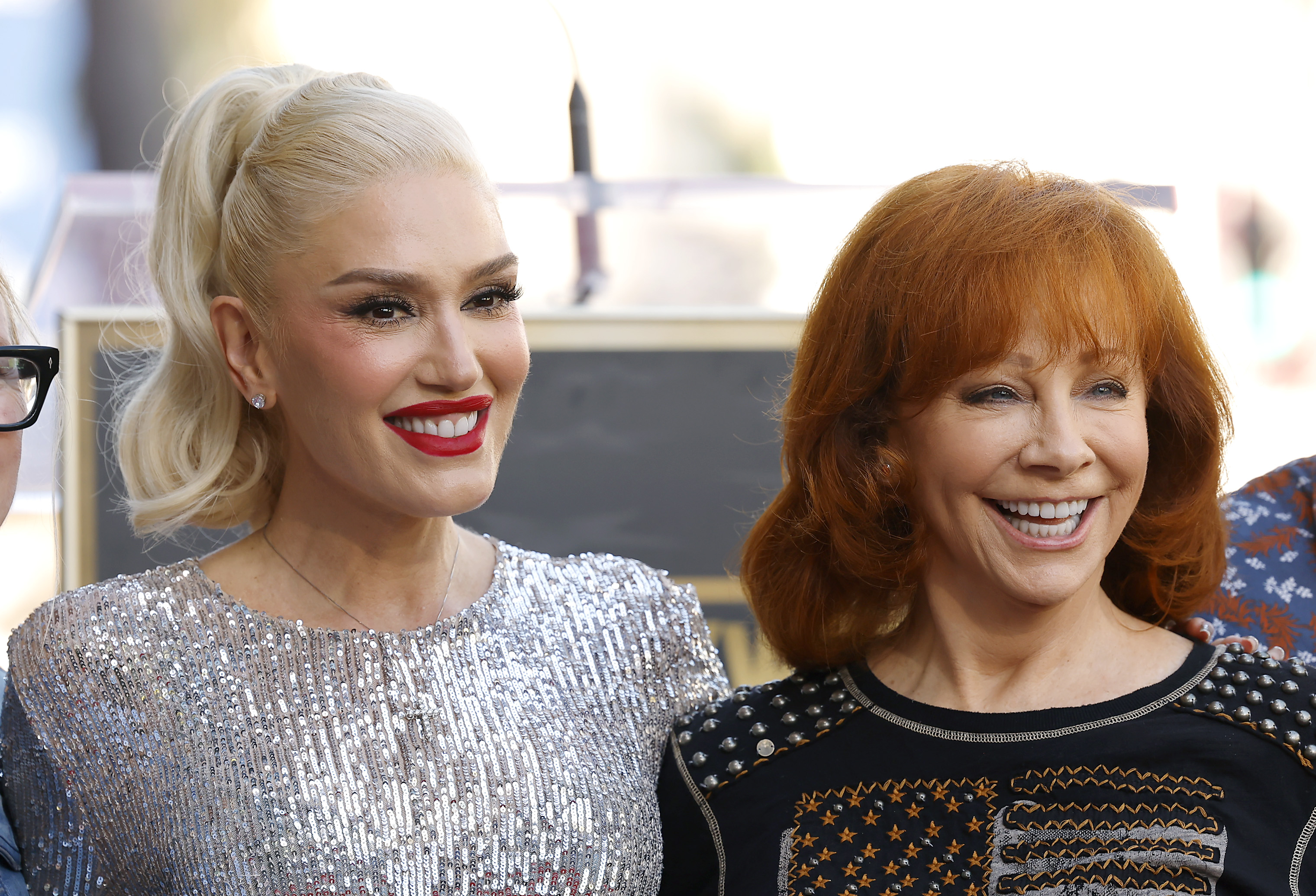 HOLLYWOOD, CALIFORNIA - OCTOBER 19: (L-R) Gwen Stefani and Reba McEntire attend the Hollywood Walk of Fame Star Ceremony Honoring Gwen Stefani on October 19, 2023 in Hollywood, California. 