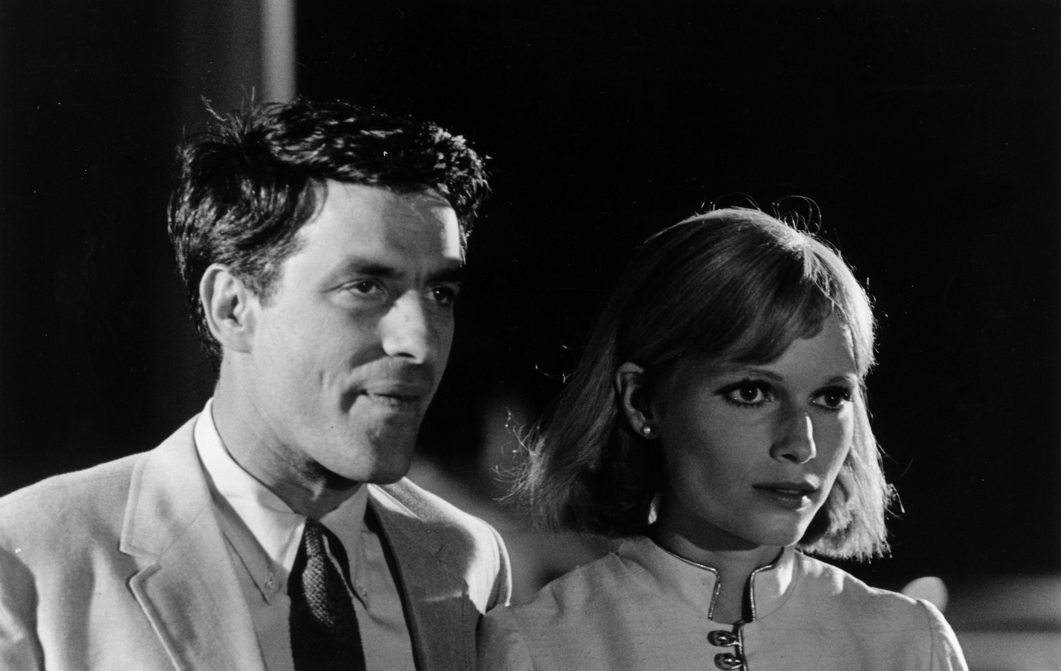25th August 1967: American film actress, Mia Farrow, with film director and actor, John Cassavetes (1929 - 1989), during the filming of 'Rosemary's Baby', a dark thriller which was directed by Roman Polanski. 