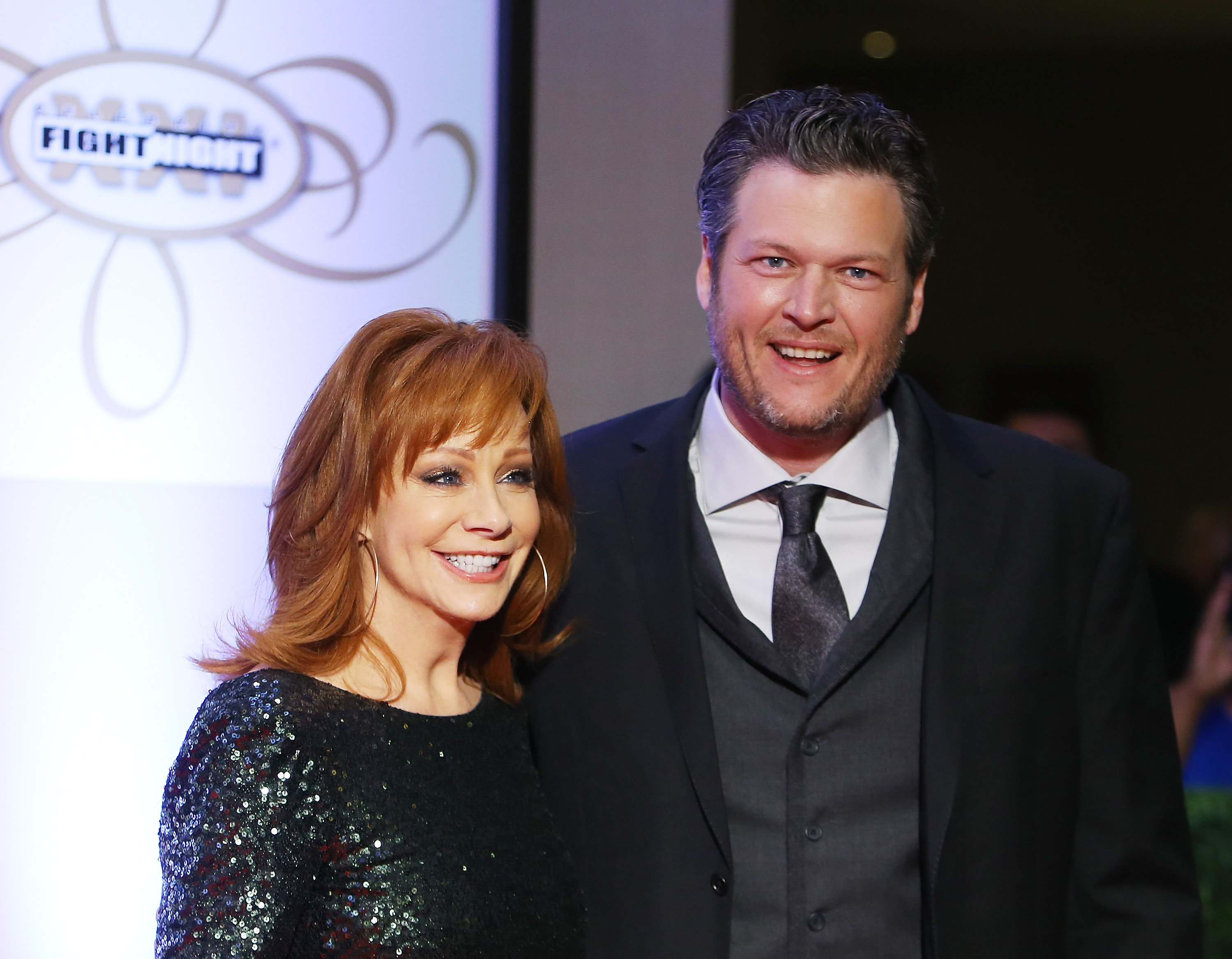 PHOENIX, AZ - MARCH 28: Reba McEntire (L) and Blake Shelton arrive at Muhammad Ali's Celebrity Fight Night held at JW Marriott Desert Ridge Resort & Spa on March 28, 2015 in Phoenix, Arizona. 