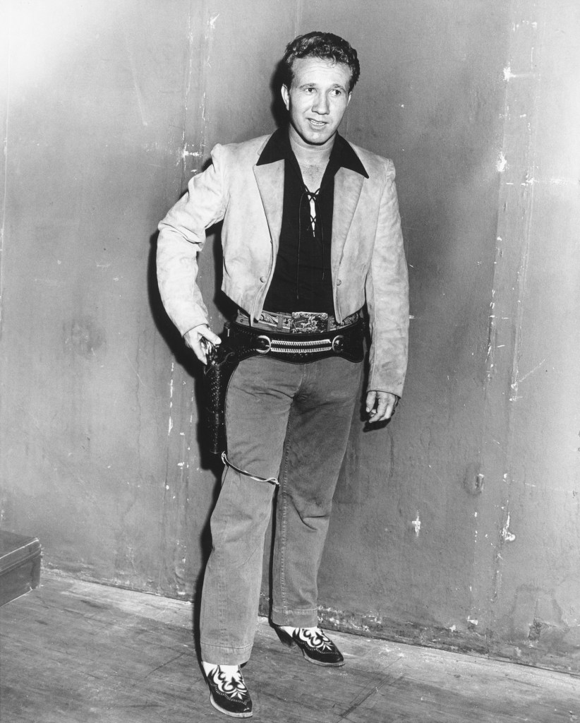 CIRCA 1958: Country singer Marty Robbins poses for a portrait in cowboy gear circa 1958.