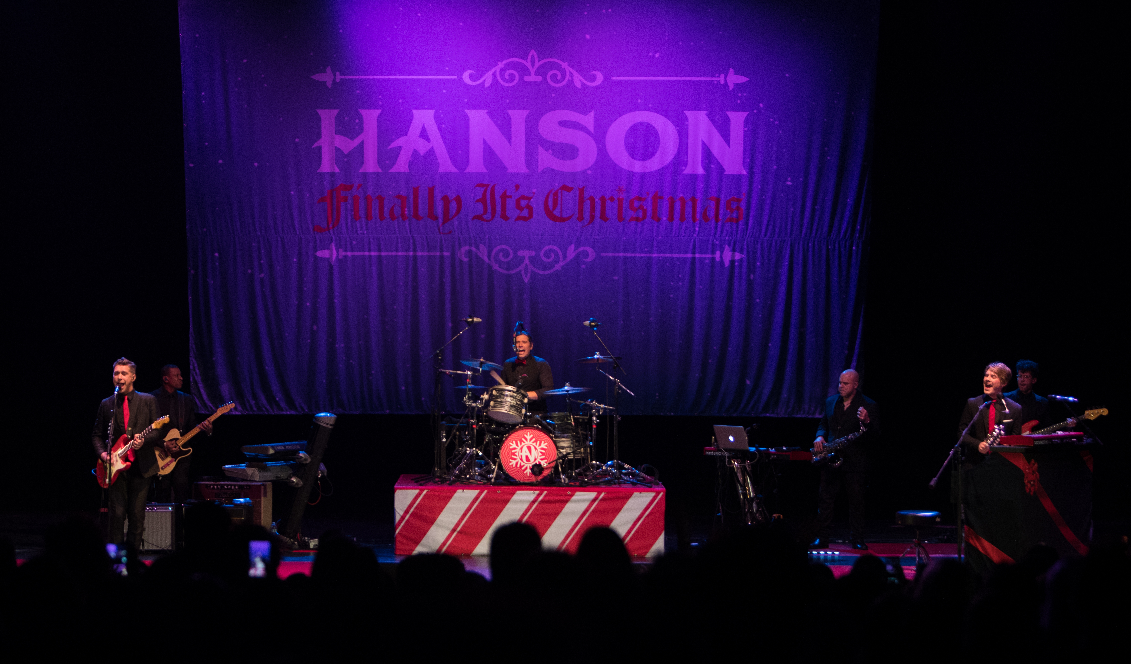 LOS ANGELES, CA - DECEMBER 06: (L-R) Isaac Hanson, Zac Hanson and Taylor Hanson of the band Hanson performs on stage at The Wiltern on December 6, 2017 in Los Angeles, California. 