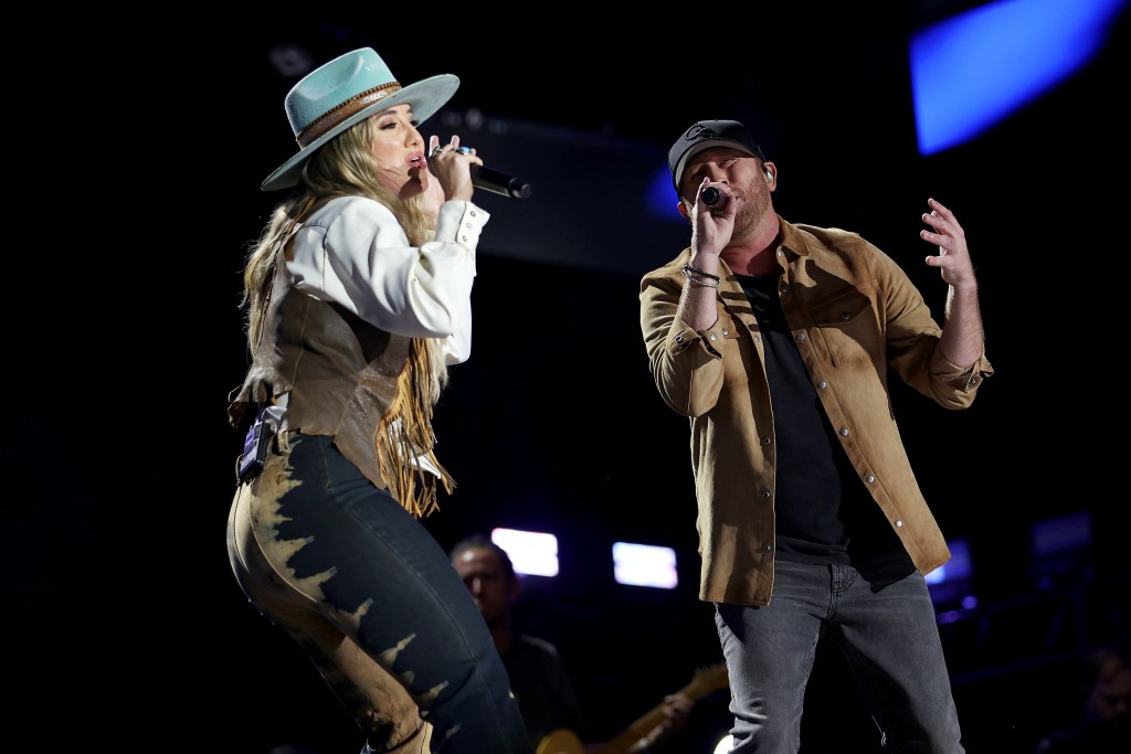 NASHVILLE, TENNESSEE - JUNE 10: (L-R) Lainey Wilson and Cole Swindell perform during day 2 of CMA Fest 2022 at Nissan Stadium on June 10, 2022 in Nashville, Tennessee.