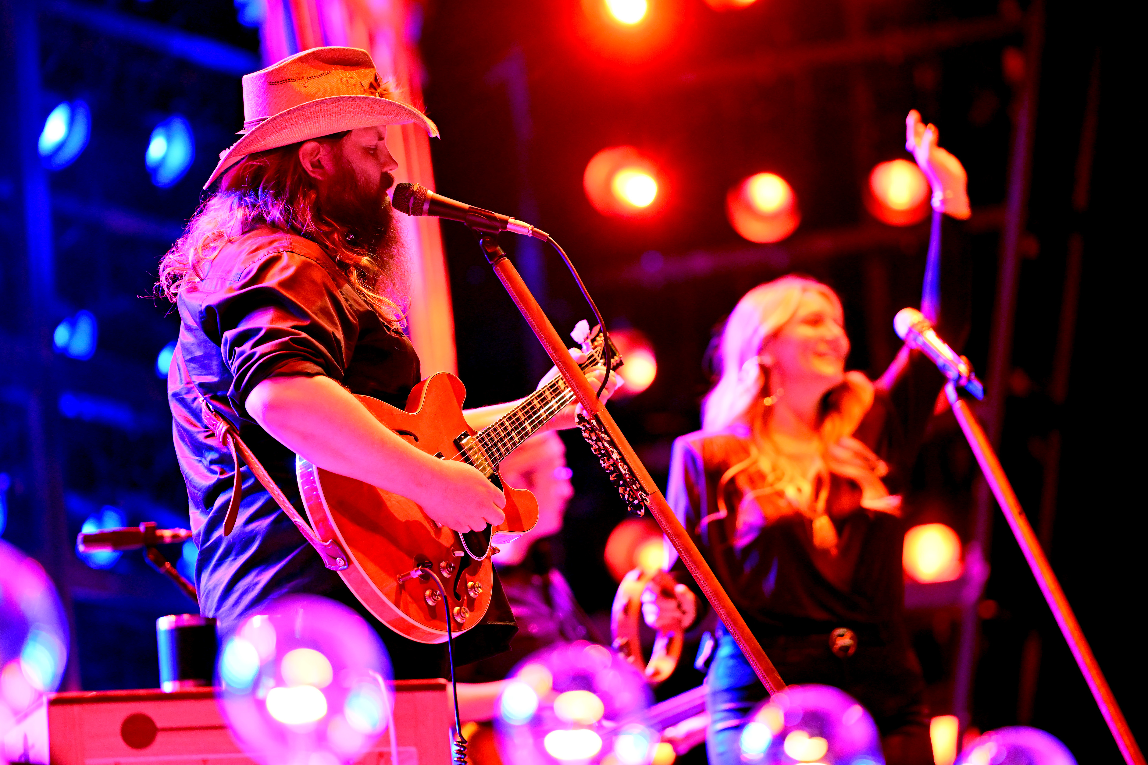 ATLANTA, GEORGIA - NOVEMBER 12: Chris Stapleton and Morgane Stapleton perform onstage during ATLive 2022 at Mercedes-Benz Stadium on November 12, 2022 in Atlanta, Georgia. 