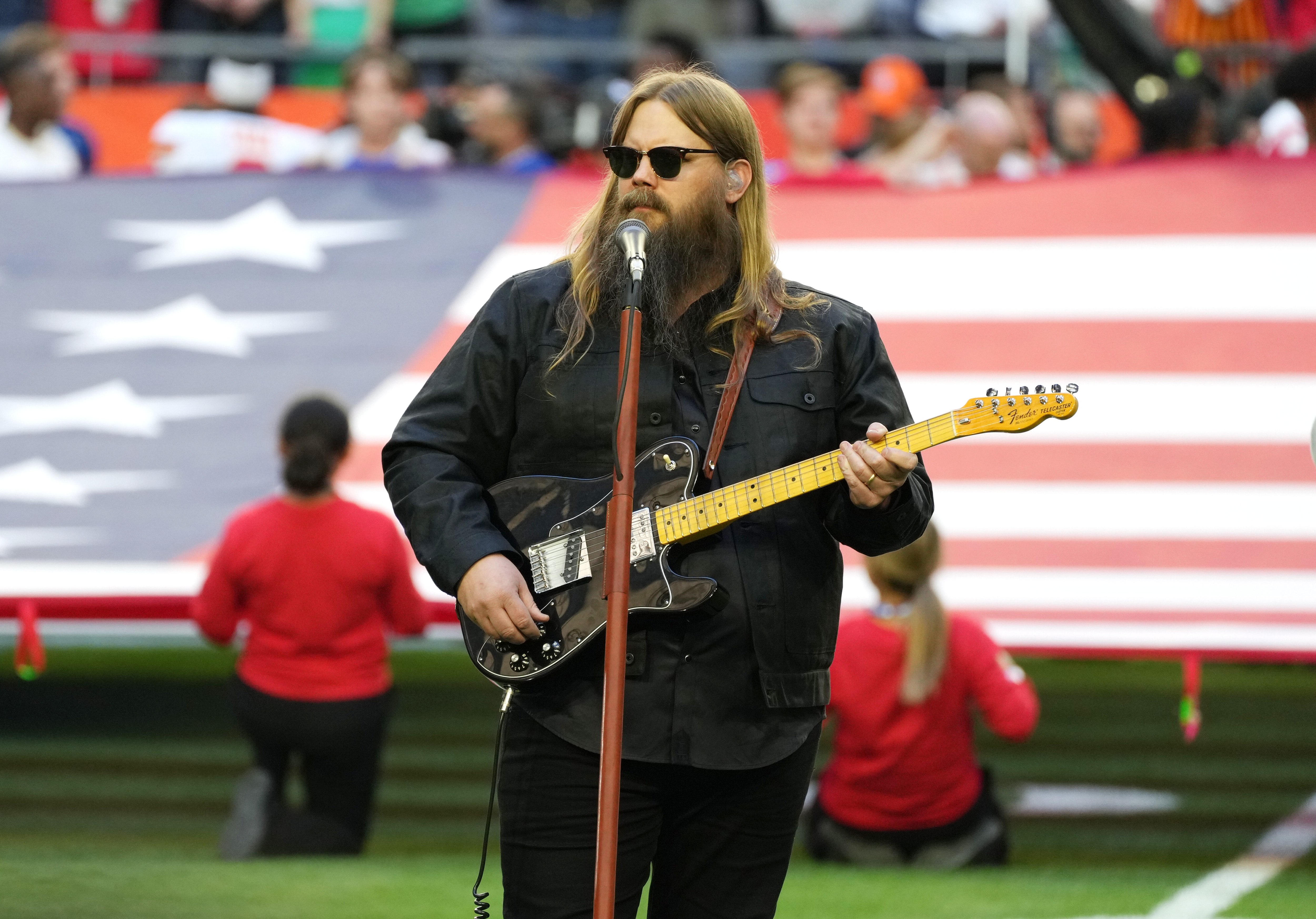 FEBRUARY 12: Chris Stapleton performs the national anthem during Super Bowl LVII at State Farm Stadium on February 12, 2023 in Glendale, Arizona. 