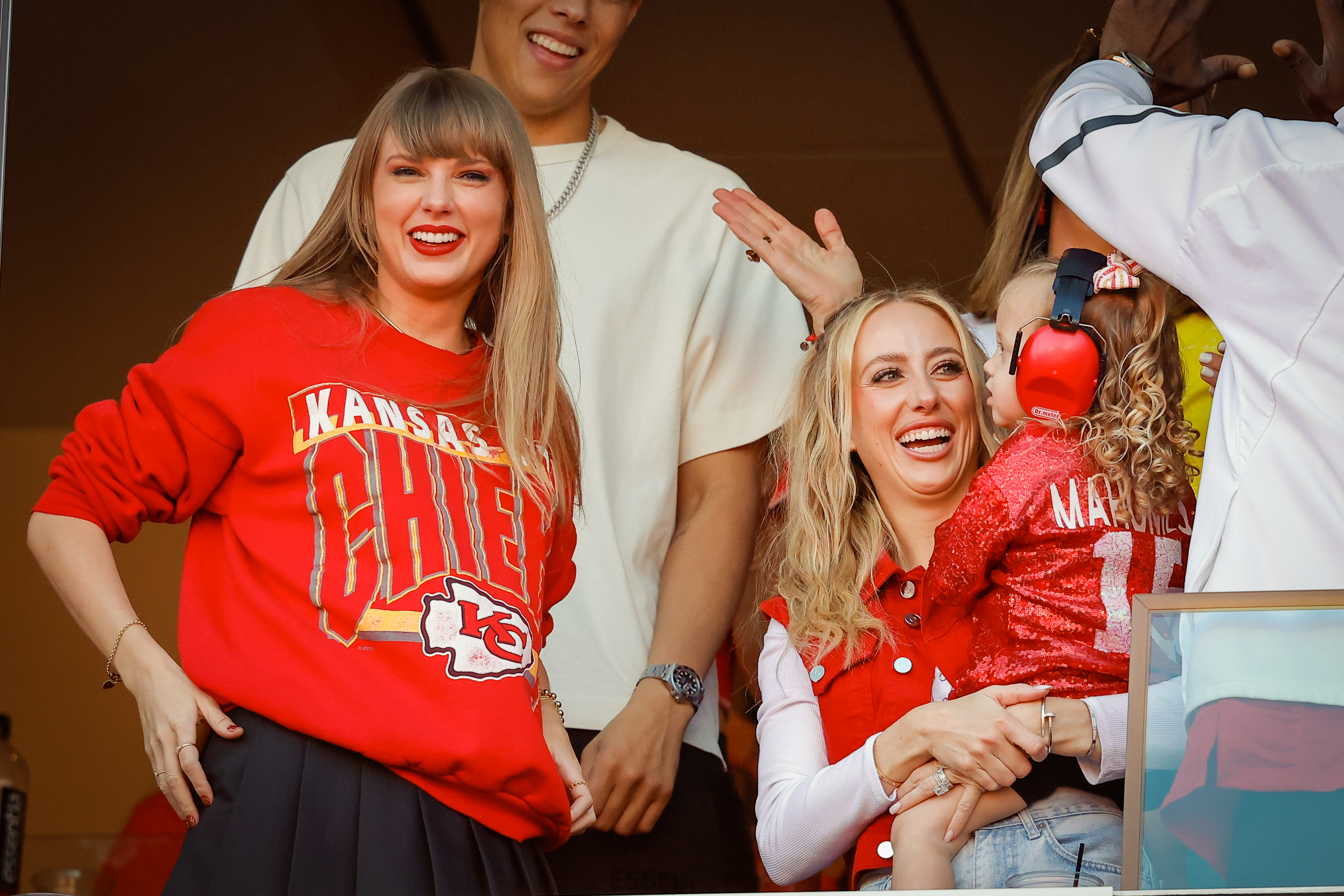 KANSAS CITY, MISSOURI - OCTOBER 22: Taylor Swift and Brittany Mahomes react during a game between the Los Angeles Chargers and Kansas City Chiefs at GEHA Field at Arrowhead Stadium on October 22, 2023 in Kansas City, Missouri.