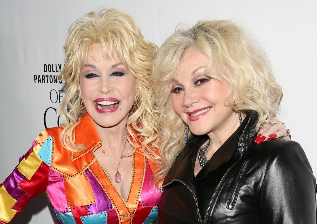HOLLYWOOD, CA - DECEMBER 02: Dolly Parton and Stella Parton attend the premiere of Warner Bros. Television's "Dolly Parton's Coat Of Many Colors" on December 2, 2015 in Hollywood, California.