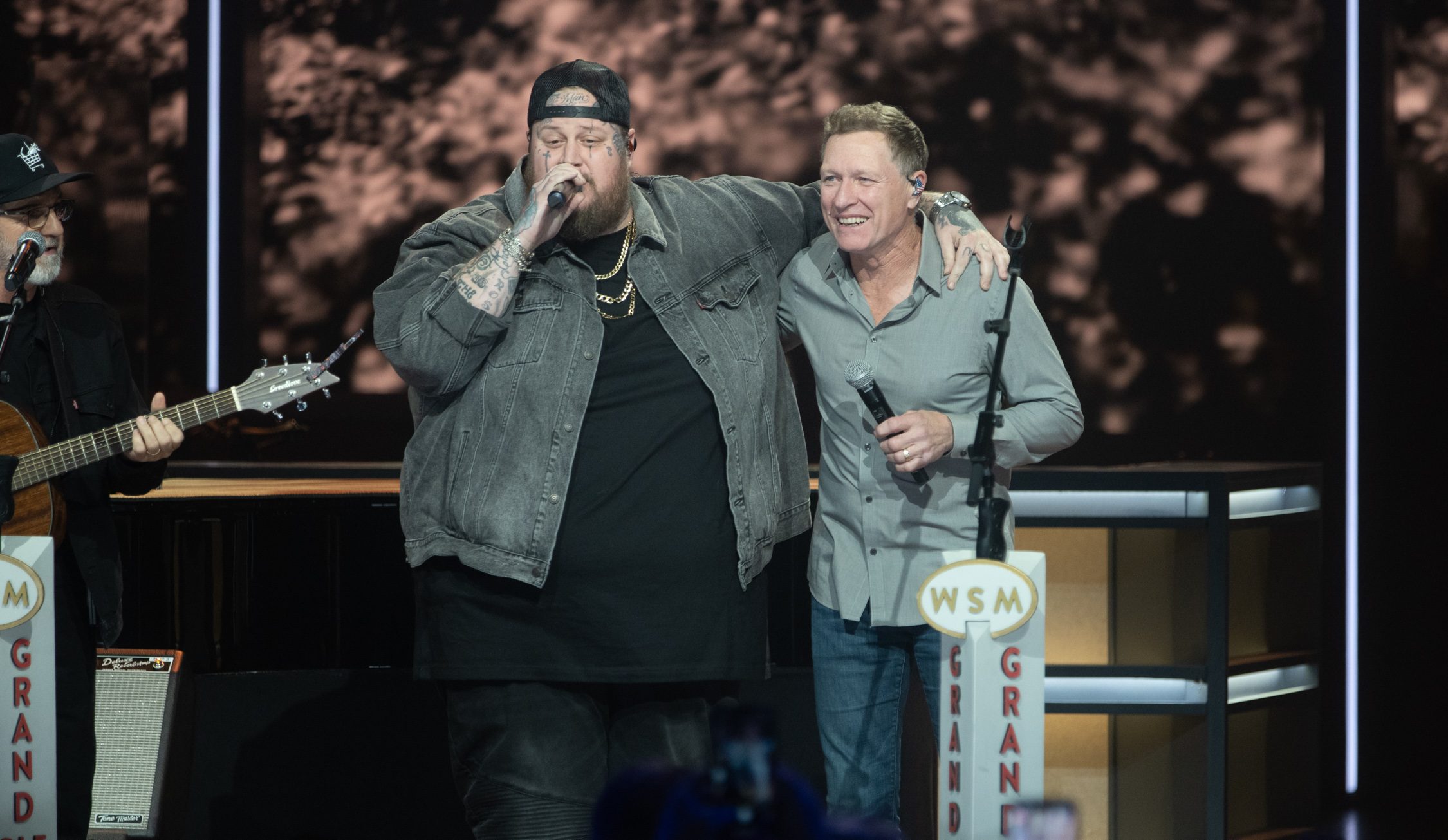 Grand Ole Opry pic of Jelly Roll and Craig Morgan onstage for their performance of "Almost Home."