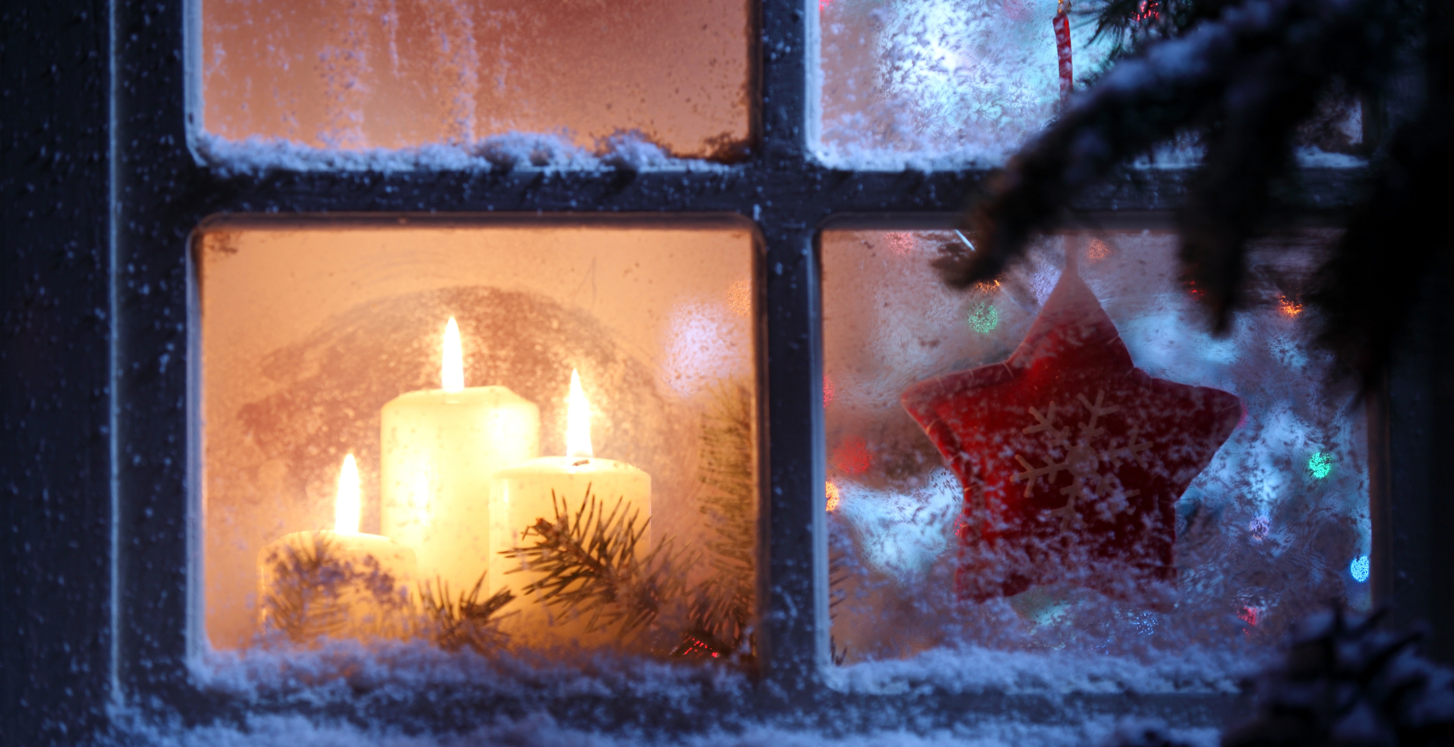 Candle in the window at Christmas