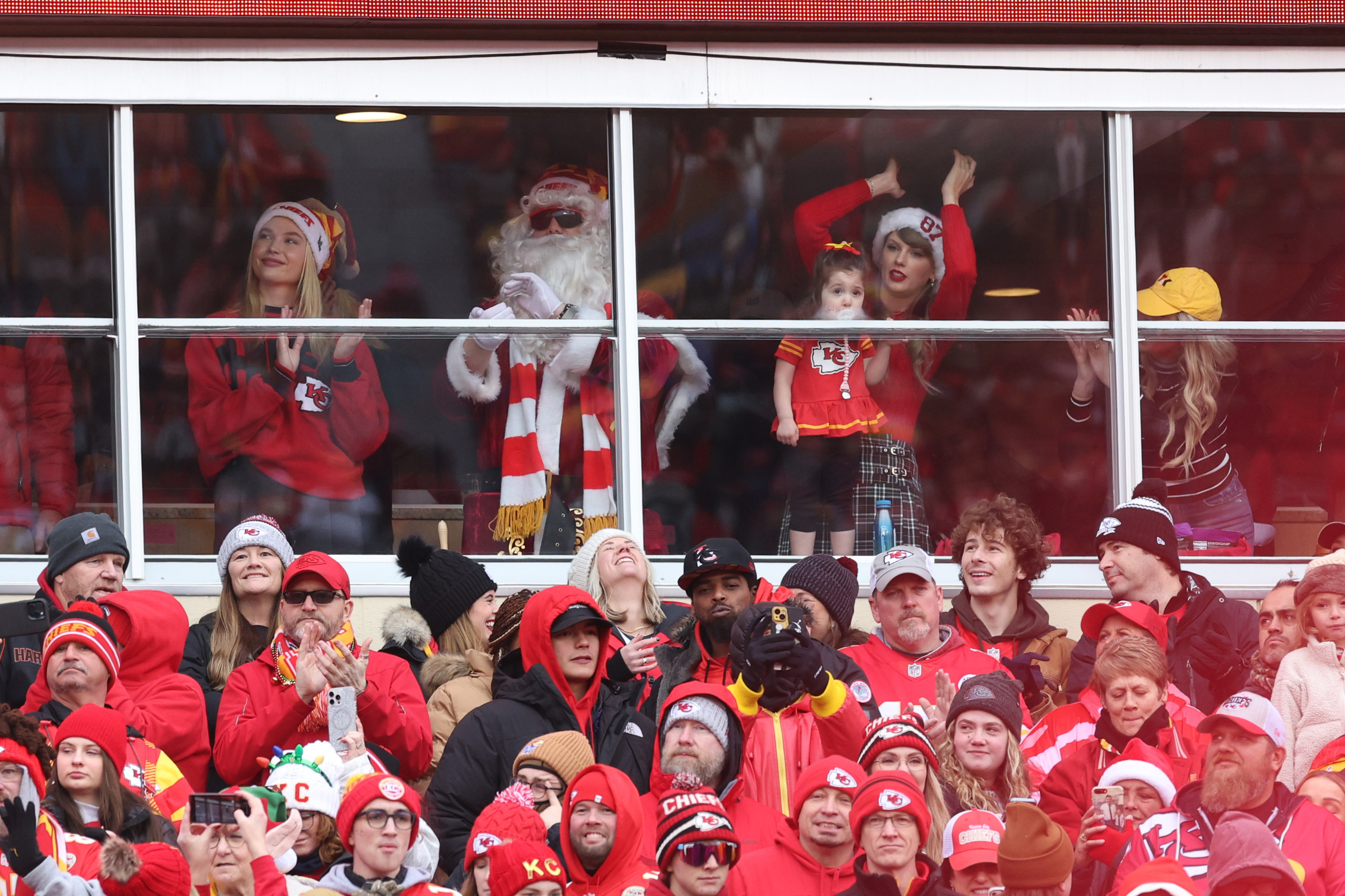 KANSAS CITY, MISSOURI - DECEMBER 25: Taylor Swift is seen in a suite prior to a game between the Las Vegas Raiders and the Kansas City Chiefs at GEHA Field at Arrowhead Stadium on December 25, 2023 in Kansas City, Missouri.