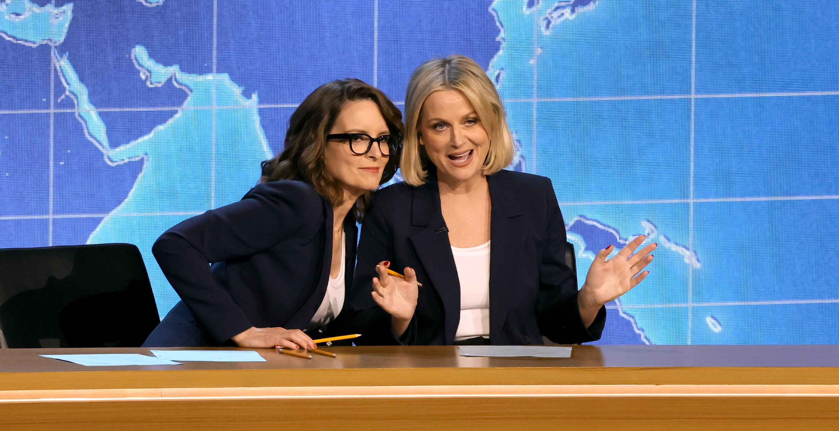 Tina Fey and Amy Poehler speak onstage during the 75th Primetime Emmy Awards