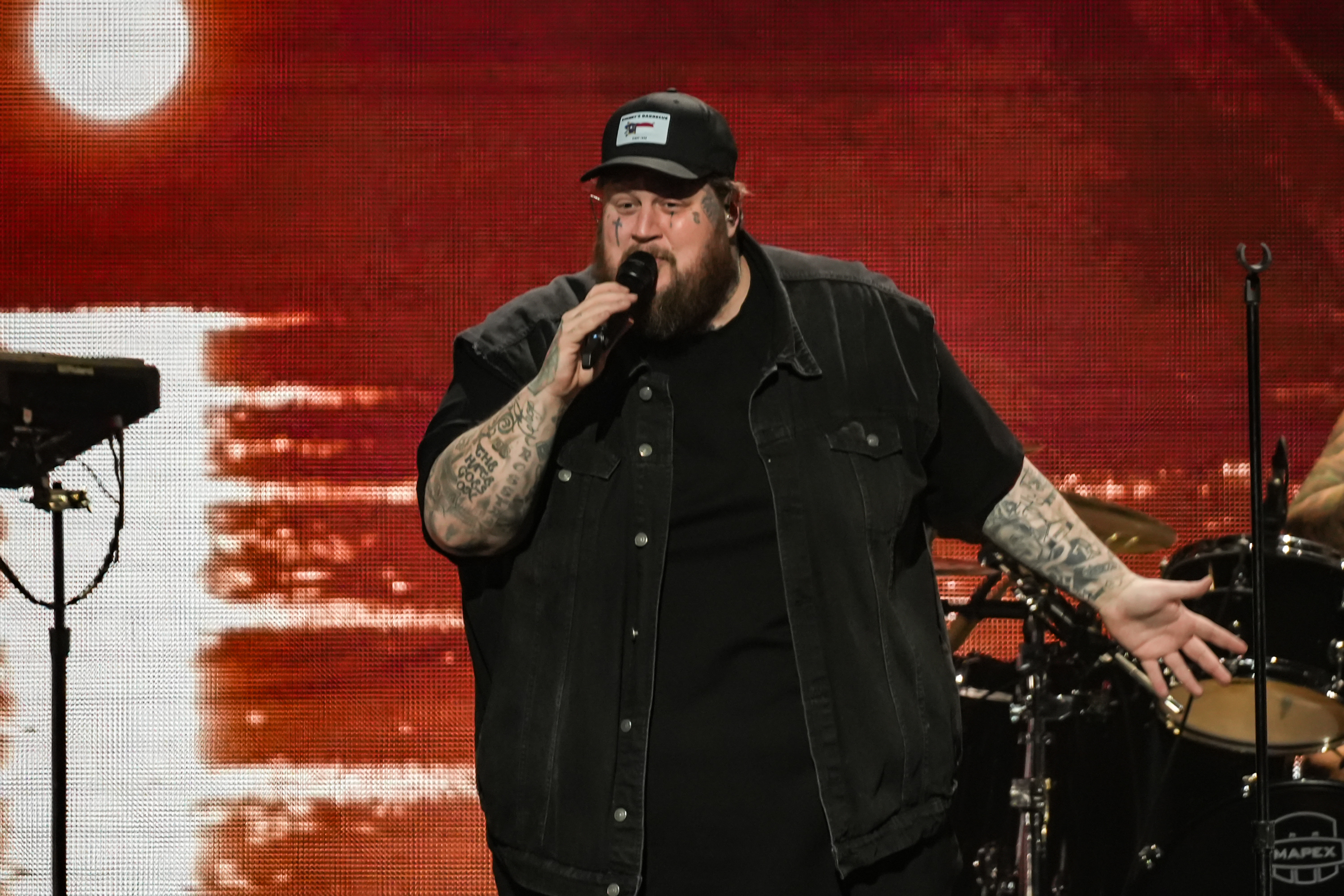 PHILADELPHIA, PENNSYLVANIA - DECEMBER 12: Jelly Roll performs onstage during iHeartRadio Q102's Jingle Ball 2023 at the Wells Fargo Center on December 12, 2023 in Philadelphia, Pennsylvania.